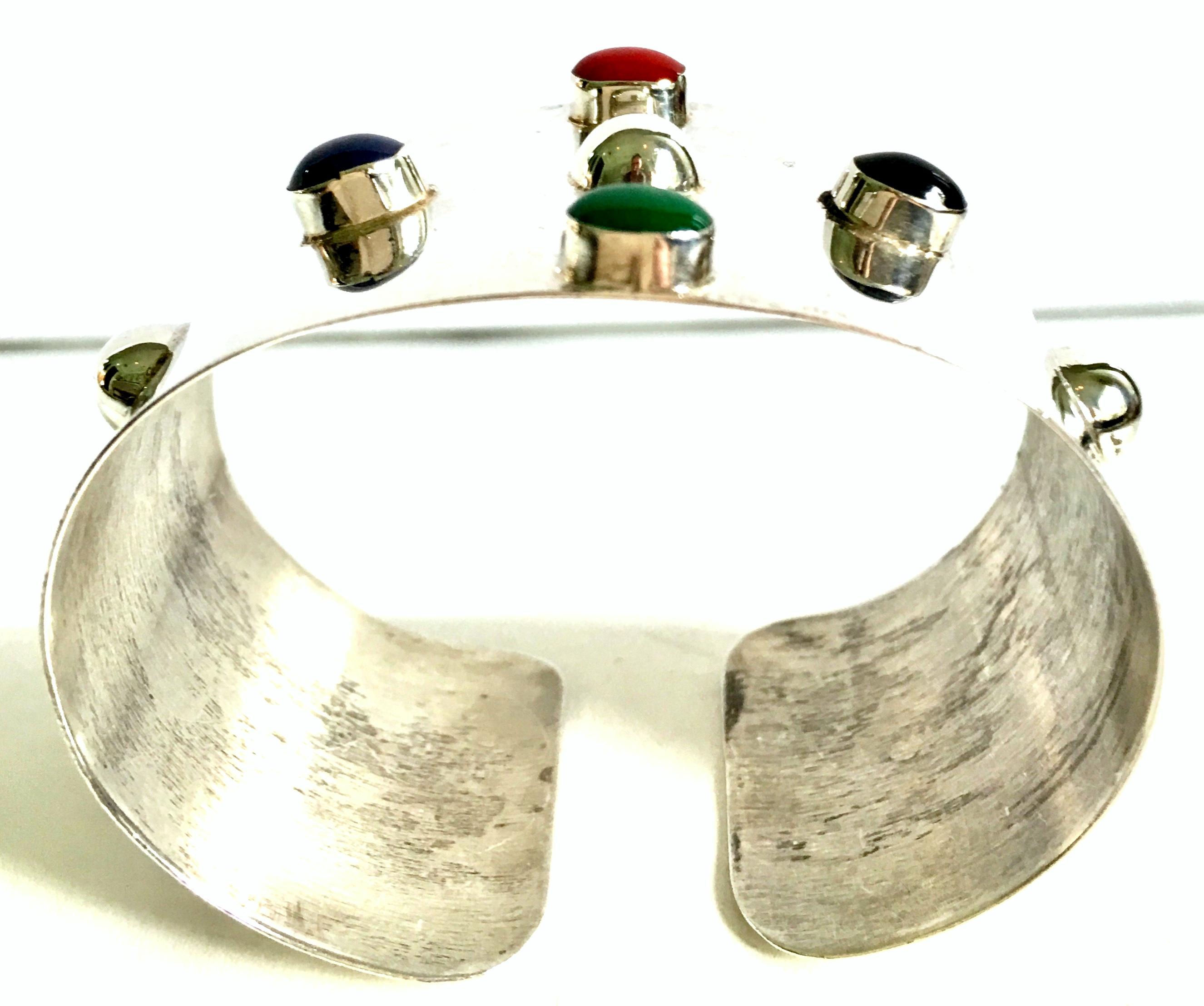 20th Century Taxco Mexico 925 Sterling & Semi Precious Stone Cuff Bracelet Signed by artist.
This lovely cuff features, malachite, onyx and carnelian semi precious bezel set stones. Each stone is approximately, .25