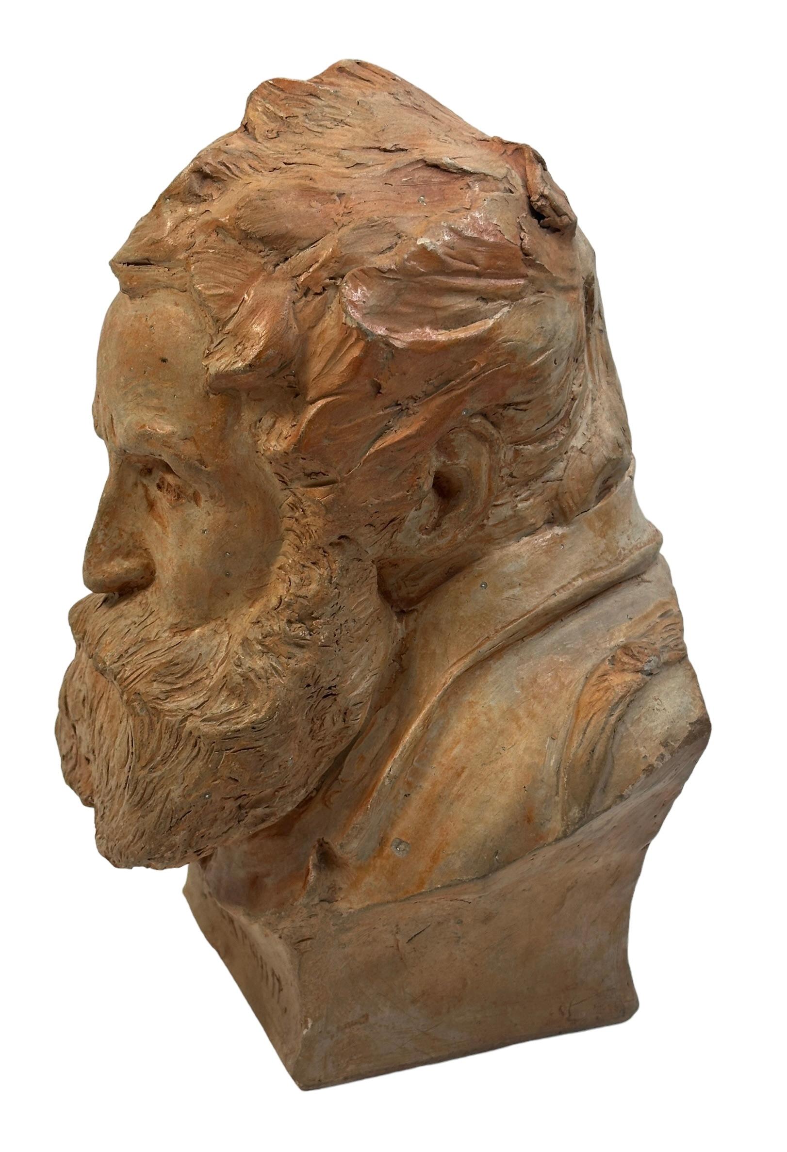 This is an impressive bust formed with terracotta of an old man. This beautiful sculpture is hand formed, 20th century. Signed by Artist and dated 1936. It makes a nice addition to any room. Found at an Estate Sale in Nuremberg, Germany.