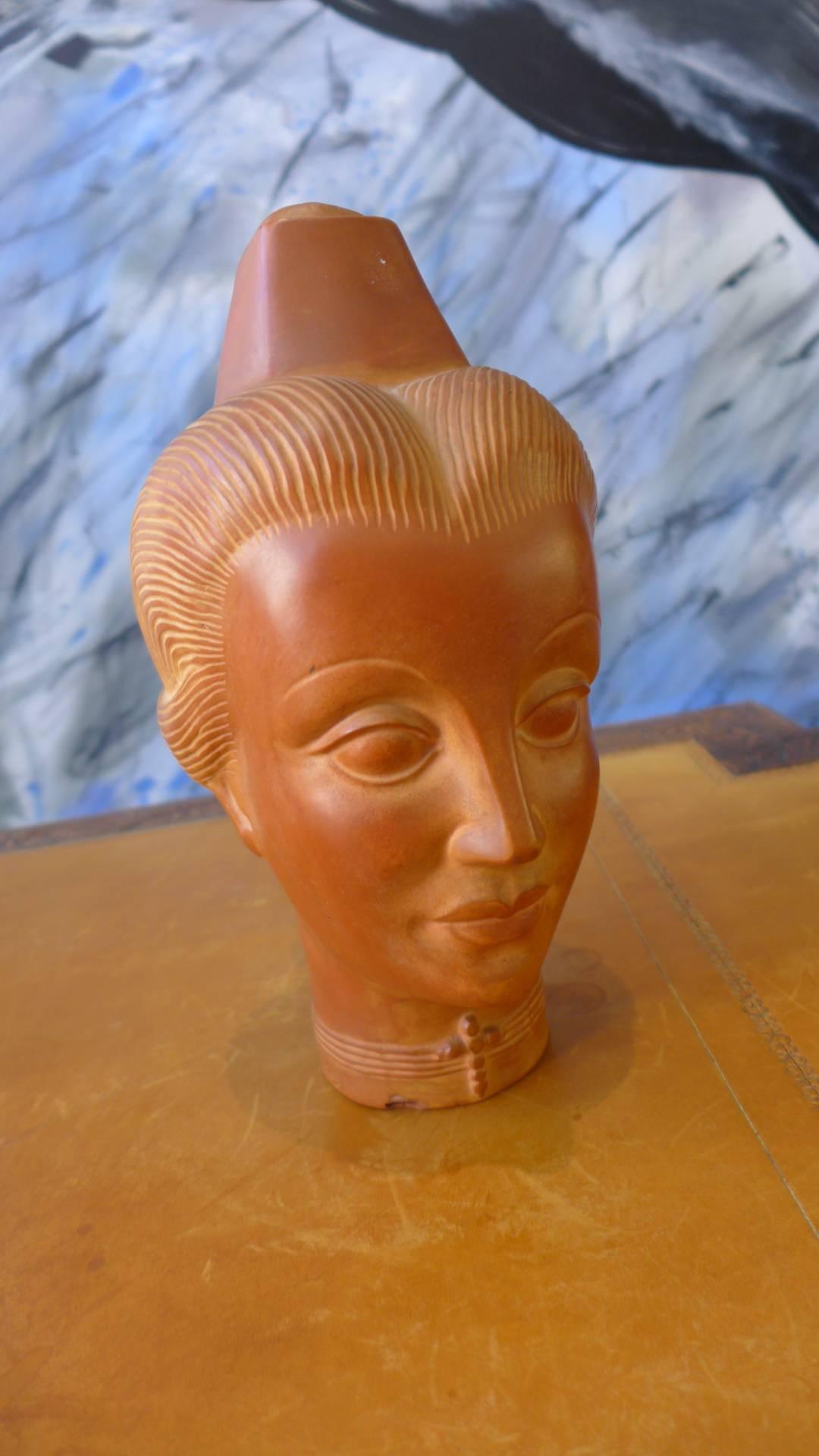 Terracotta bust of Arlesienne by Miel Romey.
Stamp on the base 