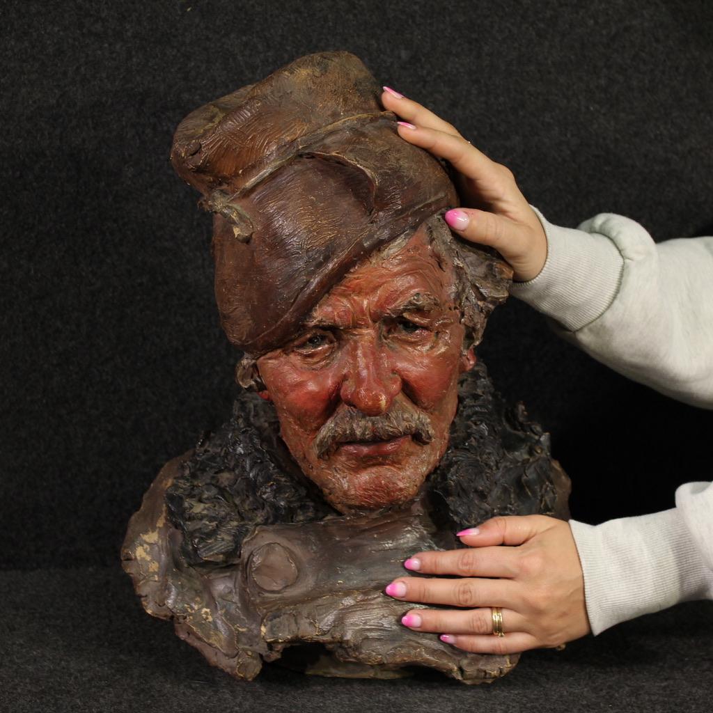 Fabulous Italian sculpture from the first half of the 20th century. Half-bust painted terracotta depicting an old fisherman of excellent quality. Sculpture finished for the center that does not have stamps or signatures, yet to be attributed. Very