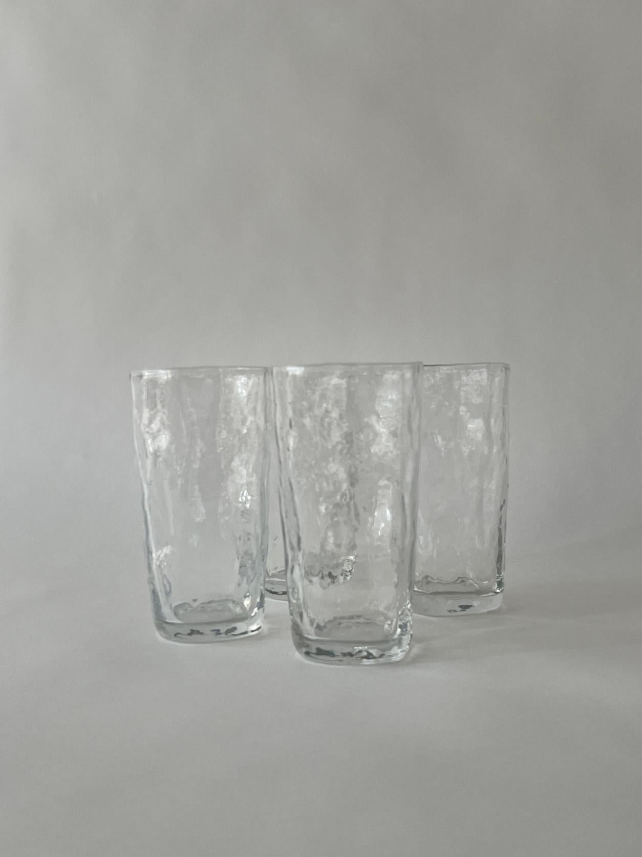 20th century textured drinking glasses expertly crafted. Perfect size and beautiful design to add to your kitchen set.

Set of 4
Measures: 3
