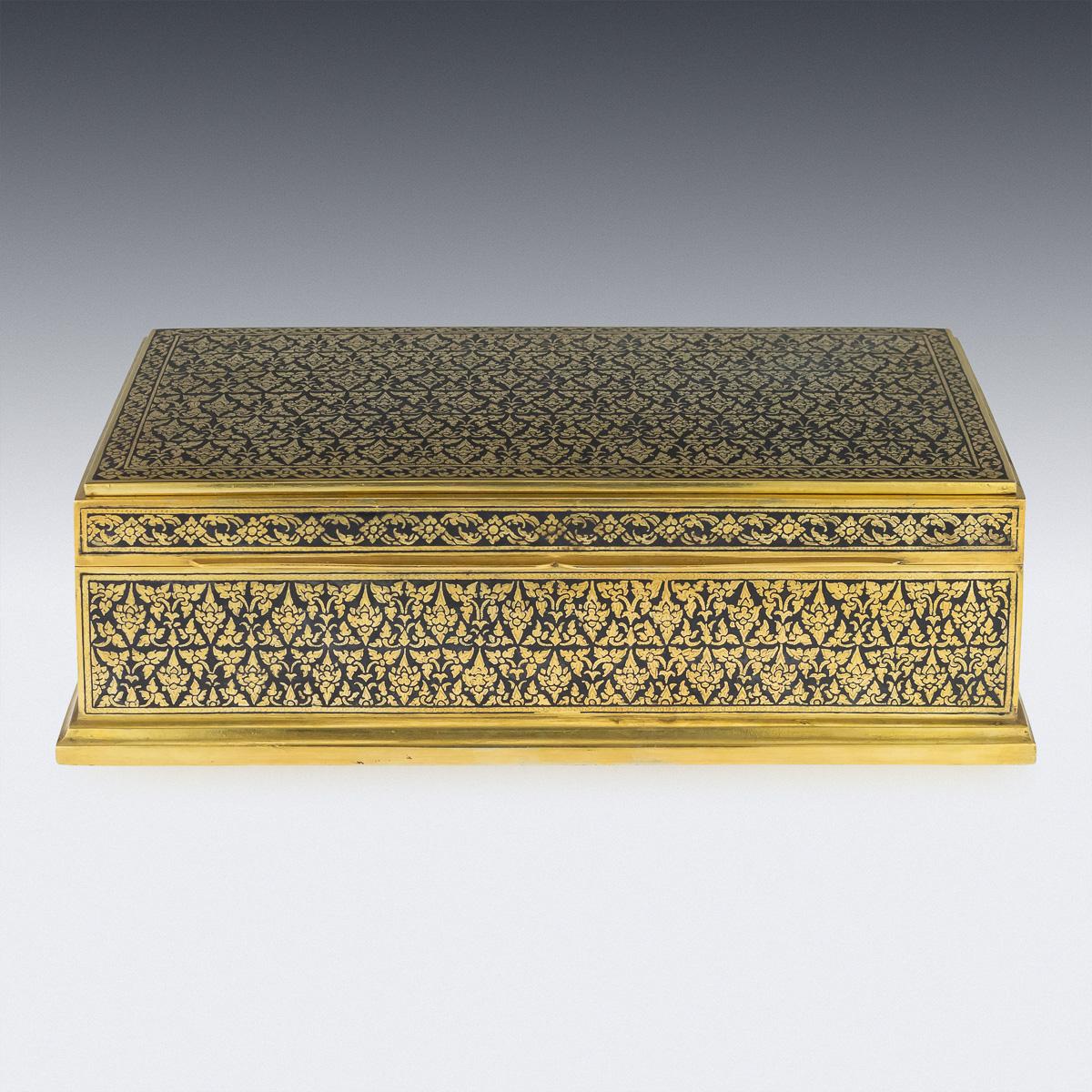 Impressive mid-20th Century Thai extremely rare and fine solid silver niello presentation box, of traditional form, decorated throughout with stylized leaves on richly gilded ground. The base is hallmarked Sterling (925 standard), Makers mark Alex &
