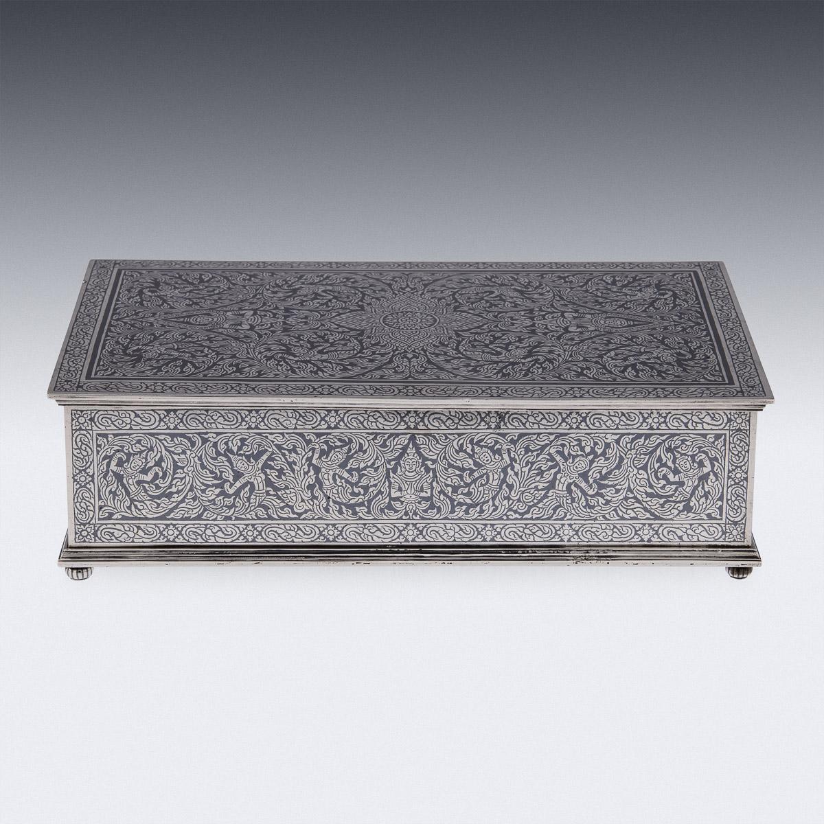 20th Century Thai silver niello presentation casket, of traditional form, decorated throughout with stylised leaves and deities on polished ground. Tested Sterling (925+ standard), Makers Unknown, probably made in Bangkok.

Condition
In great