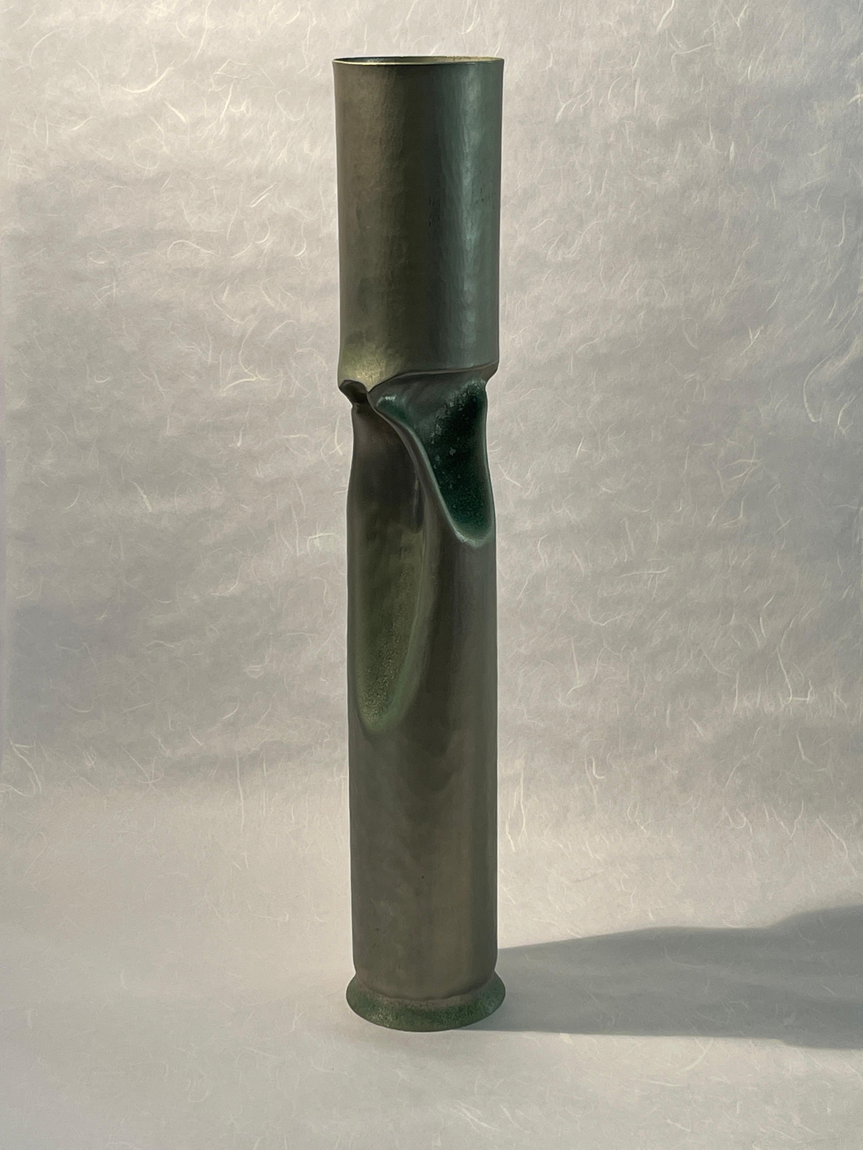 20th century Thomas Roy Markusen Nickel plated candleholder or vase. American Modernist pair of handcrafted metal candleholder in nickel plated metal, created by famed metal-smith Thomas Roy Markusen in 1980 in the United States. These unique candle