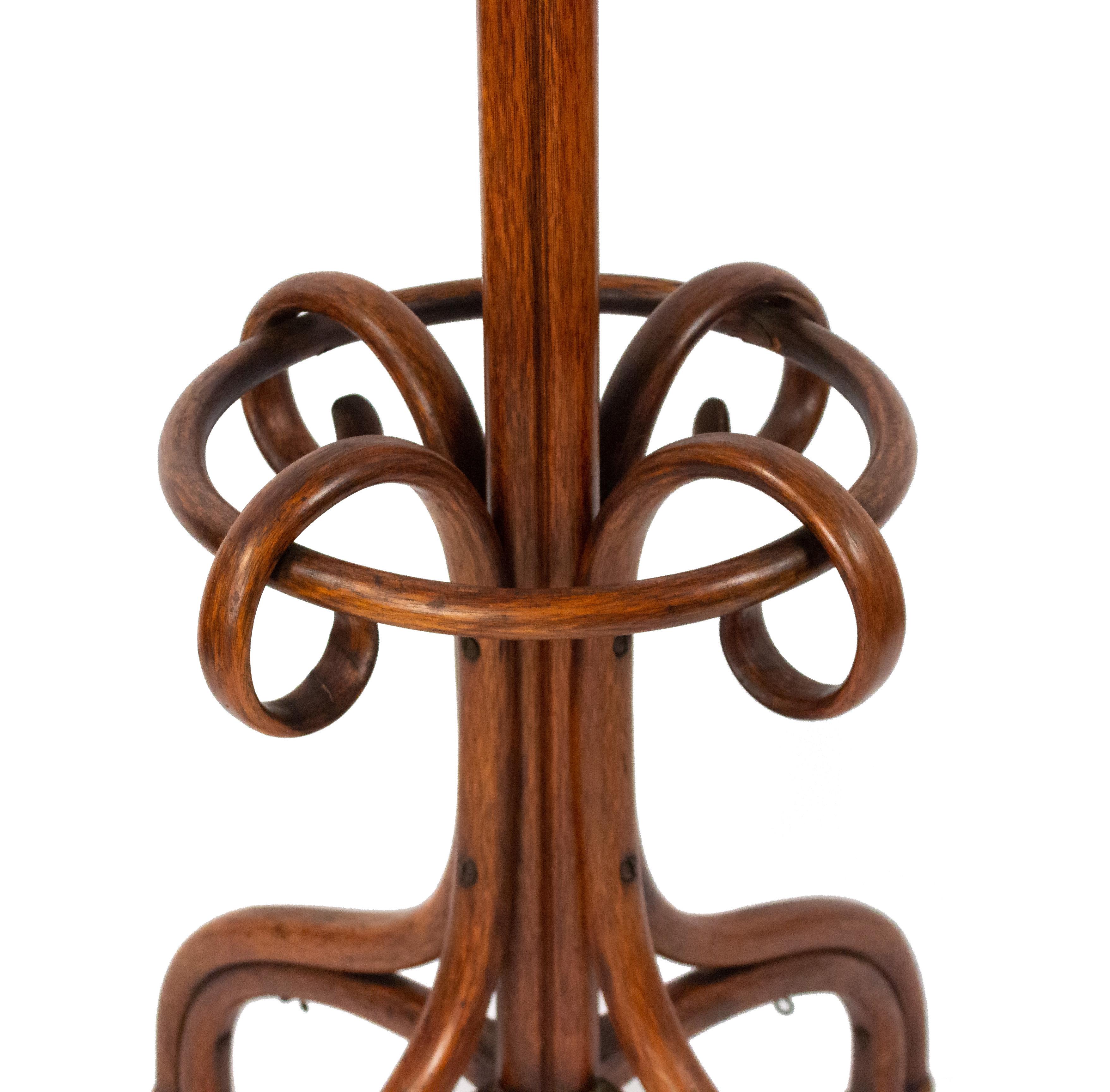 Austrian Bentwood hatrack / coat tree with replaced finial top (original THONET paper label).
 