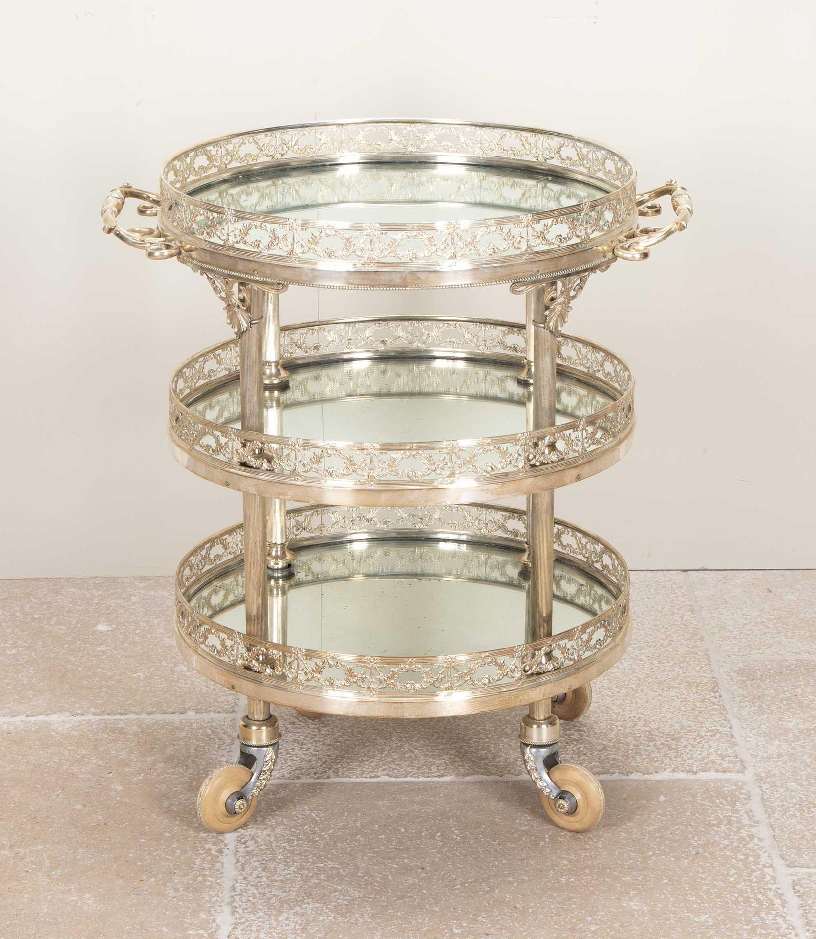 An exceptional mid-20th Century silver plate, three tier, mirrored cocktail or drinks trolley.
Art Deco in style.
England, Circa 1950.