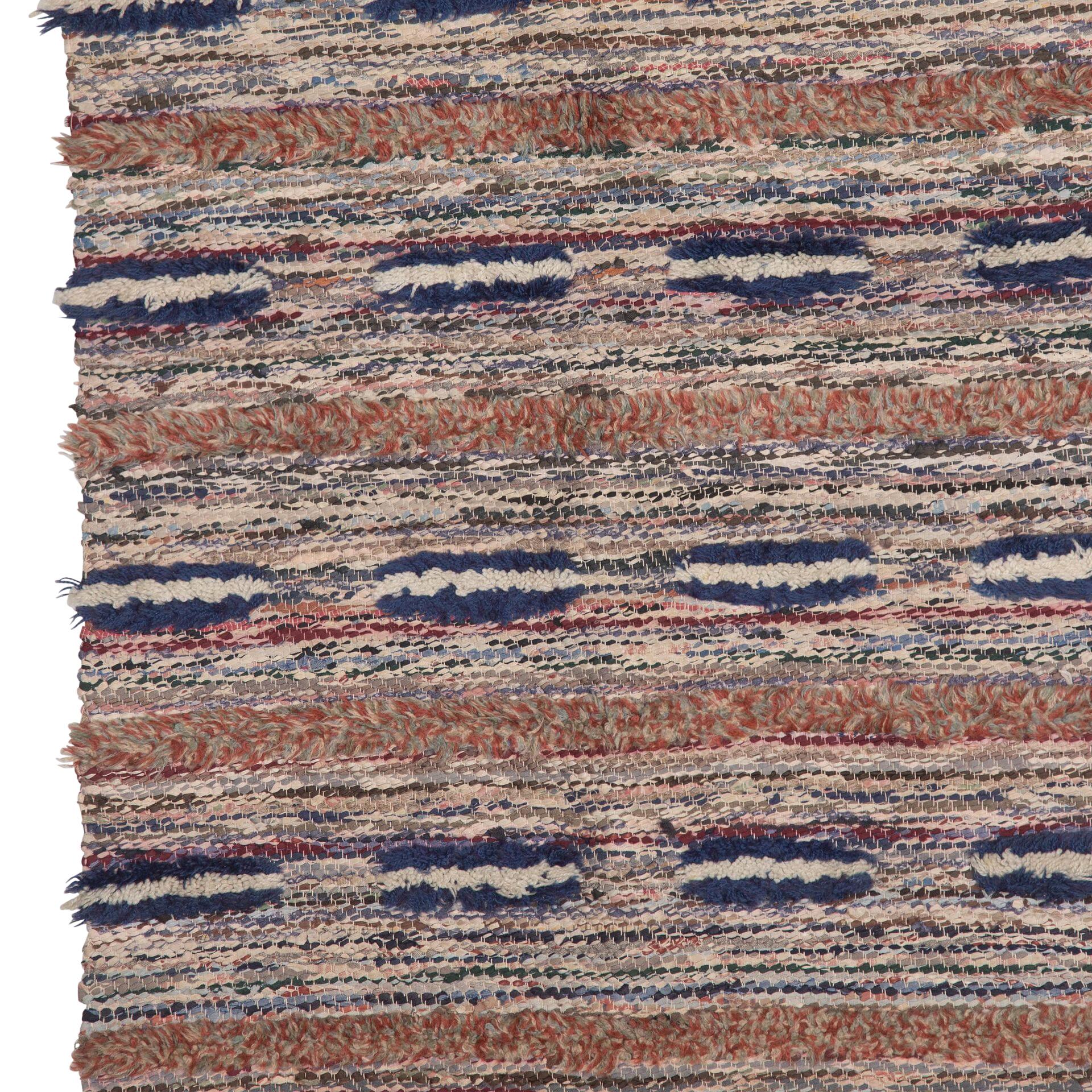 20th Century traditional Swedish rug in blue, green and orange.
With a textured feel throughout.