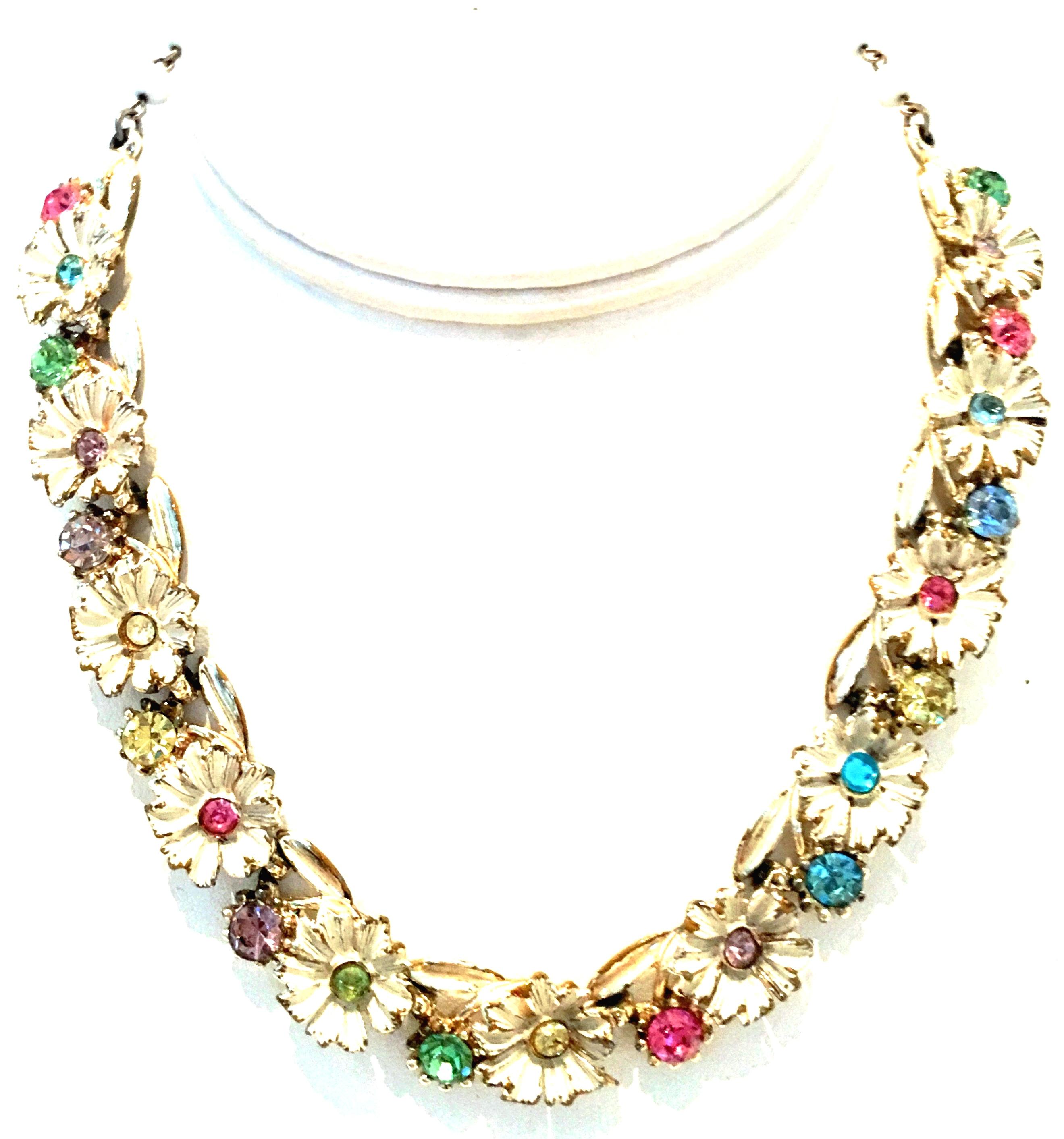 Mid-20th Century Gold, Enamel & Austrian Crystal Flower Link Choker Style Necklace And Earrings in the style of Trifari.-Set of Three Pieces. This coveted three piece set features gold plate metal with white enamel dimensional flowers and crystal