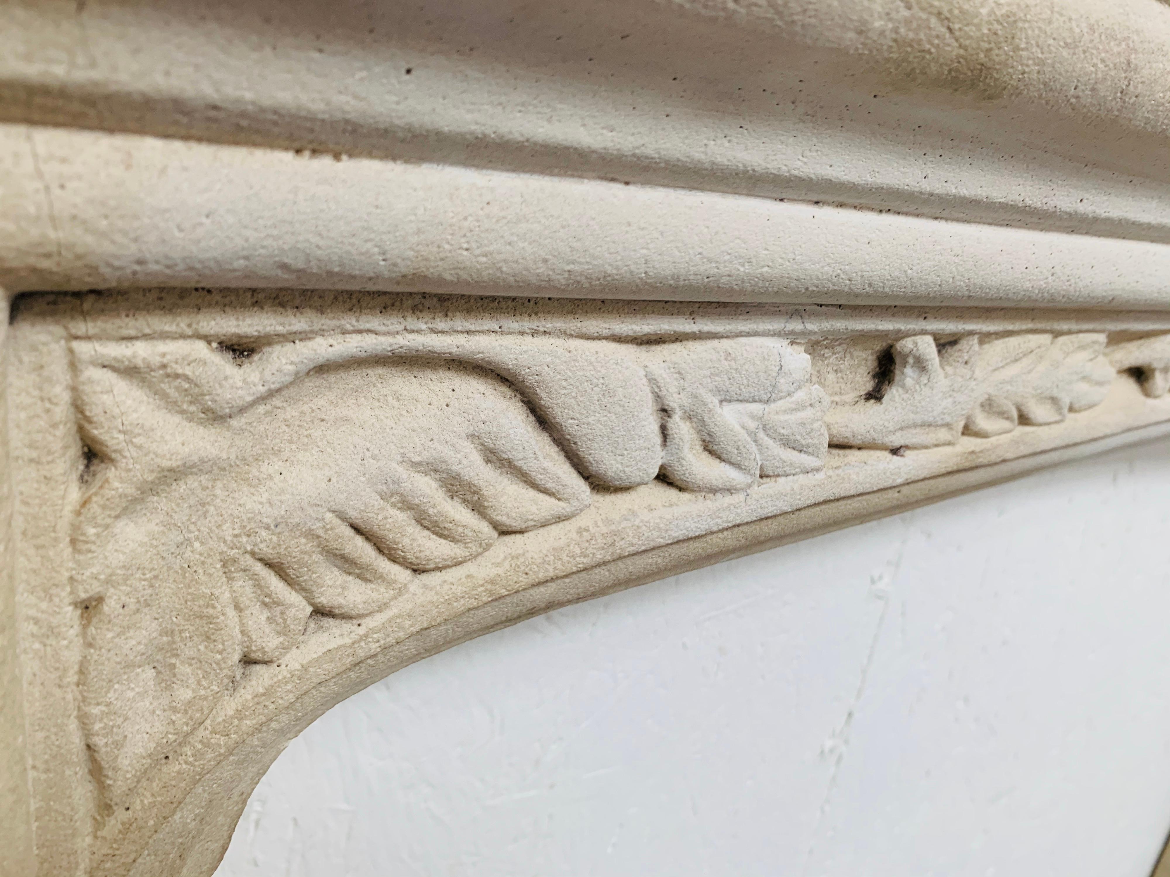Hand-Carved 20th Century Tudor Style Limestone Fireplace Mantelpiece