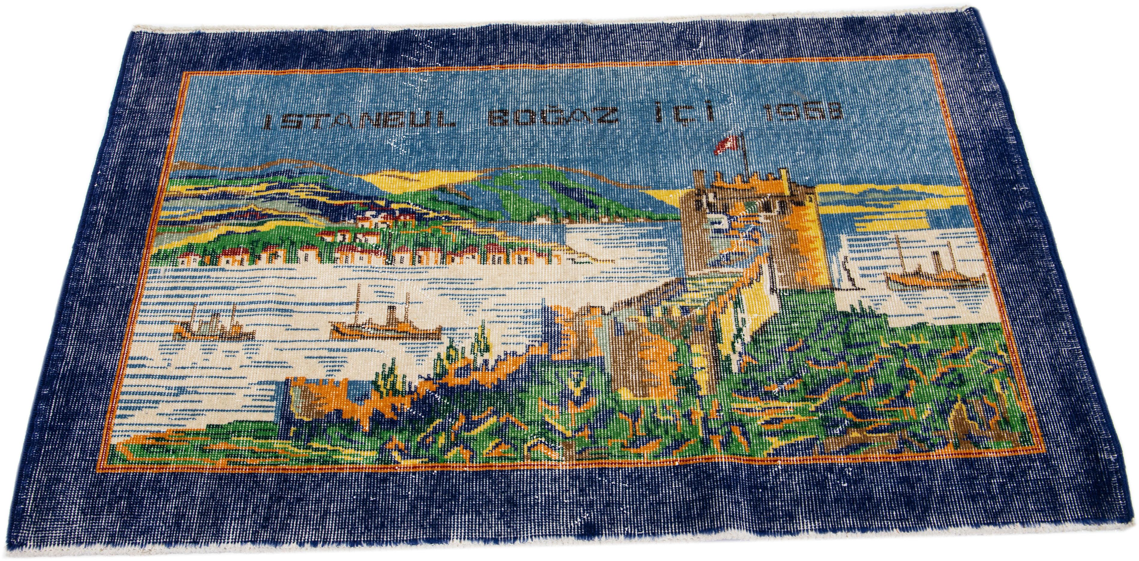 Hand-Knotted 20th Century Turkish Handmade Pictorial Wool Rug with Blue Color Field For Sale