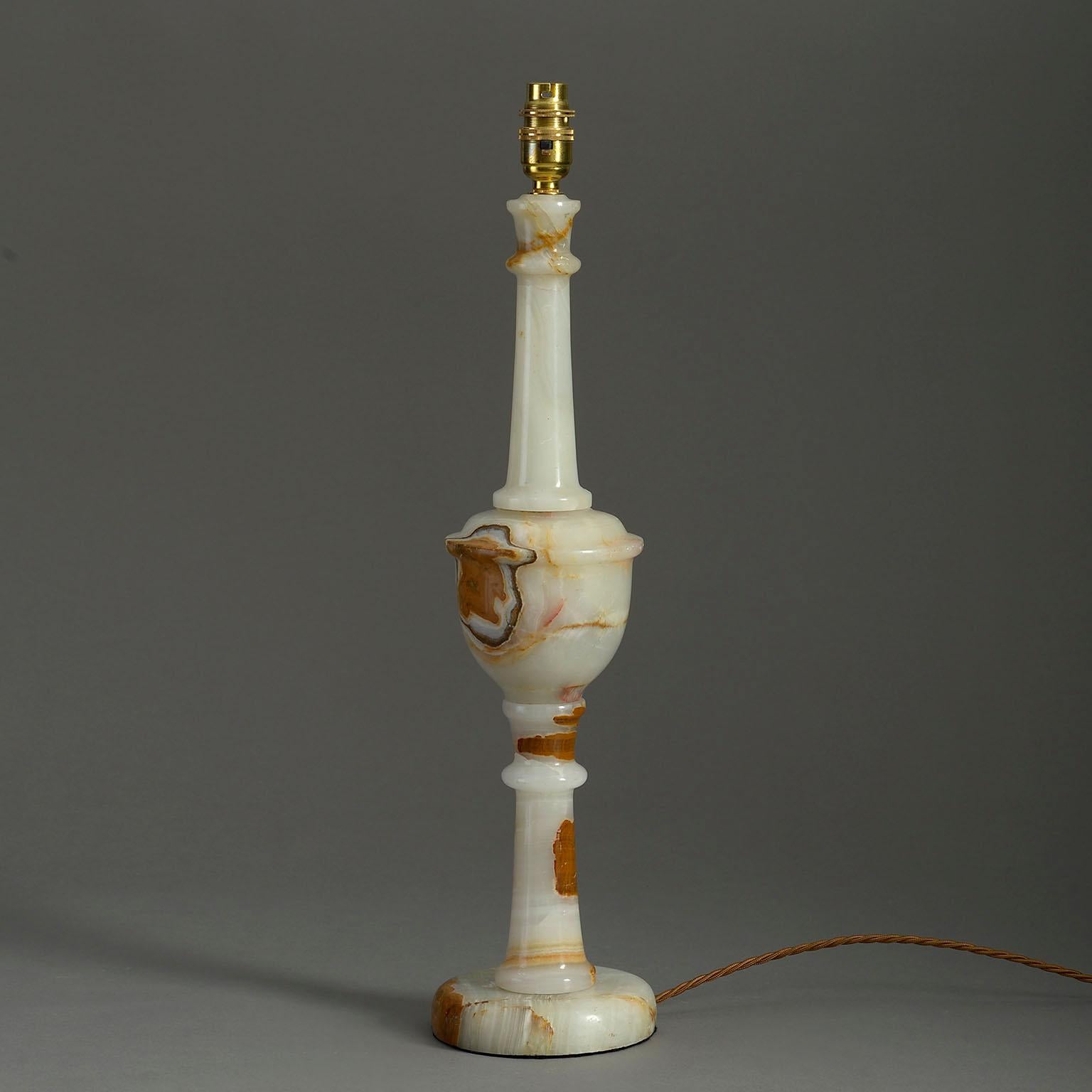 A mid-twentieth century tall turned alabaster column lamp with rich veining.

Dimensions refer to alabaster parts only.

Wired to UK standards. This lamp can be rewired to all international specifications inclusive of price.

Shades available to