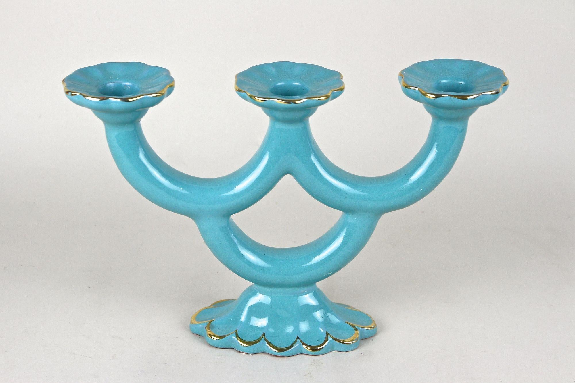Extraordinary, rare Art Deco ceramic candleholder from the period in Austria around 1930. An outstanding designed 20th century candleholder from the famous workshops of Gmundner ceramic glazed in this amazing looking turquoise tone. This artfully
