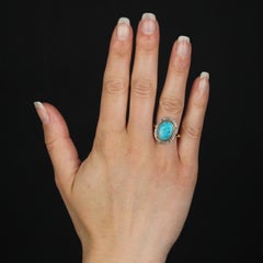 Anillo ovalado de oro de 18 quilates y platino con turquesa del siglo XX y diamantes de pirita