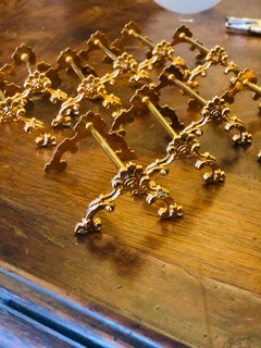 20th Century Twelve French Gold-Plated Knife Rests with Floral Decoration