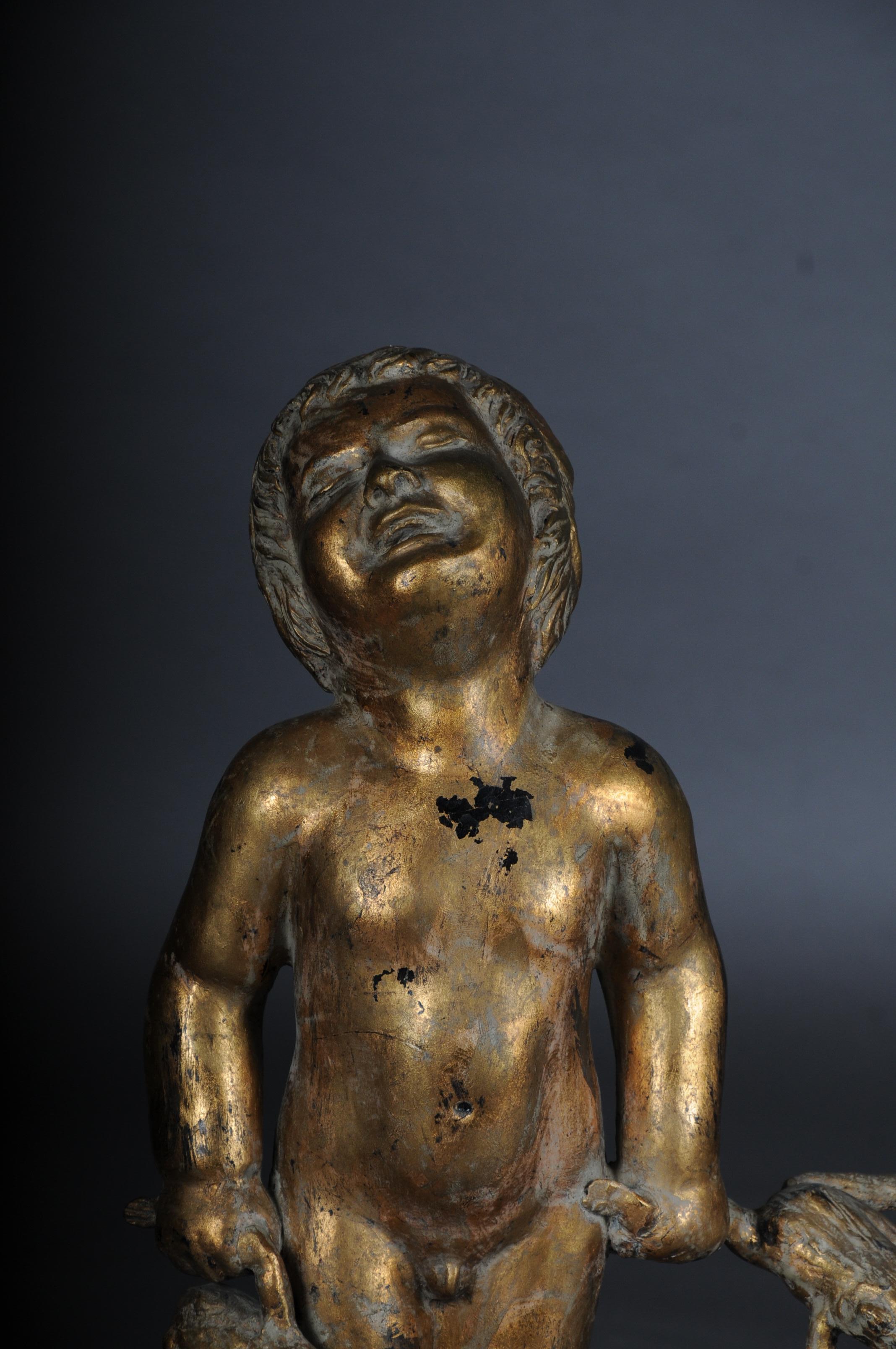 20th Century Unique sculpture of a putto with frogs, gold

Cast zinc with patented gilding, a naked, laughing putto standing on a round ball, holding 2 frogs by the frog's legs. Octagonal base also with some frogs.