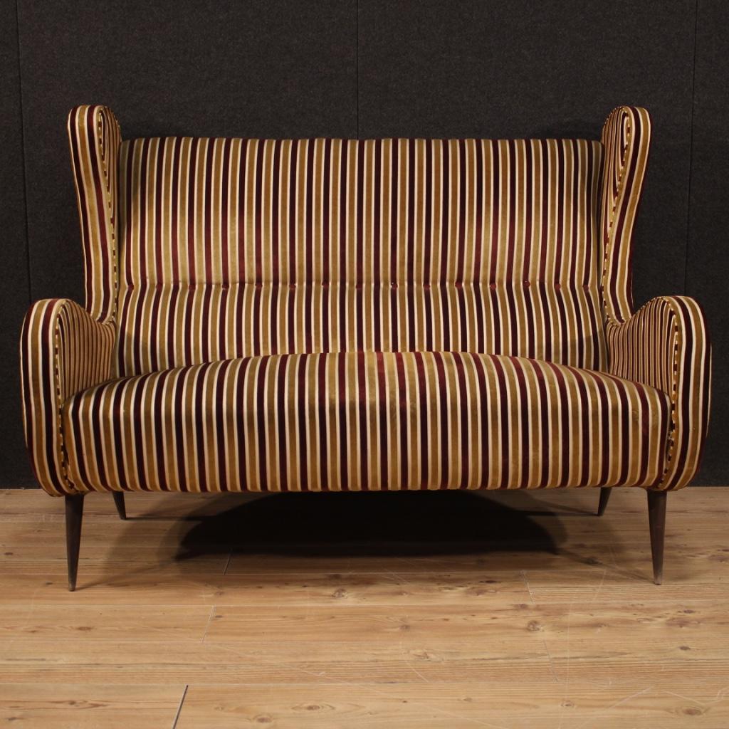 Italian sofa from the 1960s-1970s. Furniture of fabulous line and construction, in Zanuso style, covered in fabric and velvet. Sofa that is part of a living room complete with two armchairs and two chairs (see photo and ask for the bulk price if