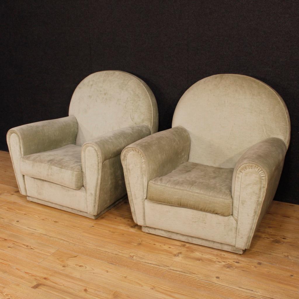 Pair of Italian armchairs from 1970s-1980s. Frau style furniture covered in velvet, of beautiful line and pleasant decor. Velvet that shows small signs of wear (see photo), overall in fair condition. Design armchairs of excellent comfort ideal to be
