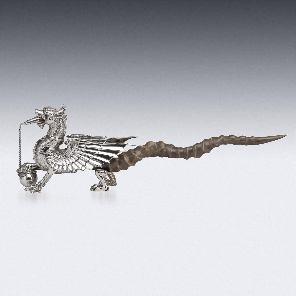 Antique early-20th century Victorian silver plated & horn mounted table cigar lighter. The large Blackbuck antelope horn is mounted with a fire breathing dragon. The exemplary craftsmanship is shown in the cast detail of the silver plated dragon.