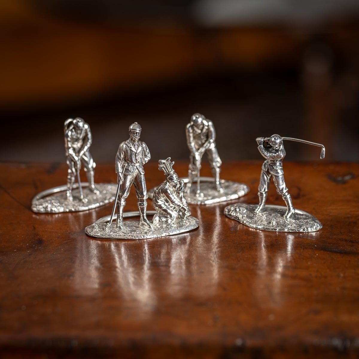 Antique late 19th Century Victorian very rare solid silver set of four menu holders, each holder modelled as golf players. Each menu holder is Hallmarked English silver (925 Standard), London, year 1896 - 1897 (a & b), Maker's mark GC (George