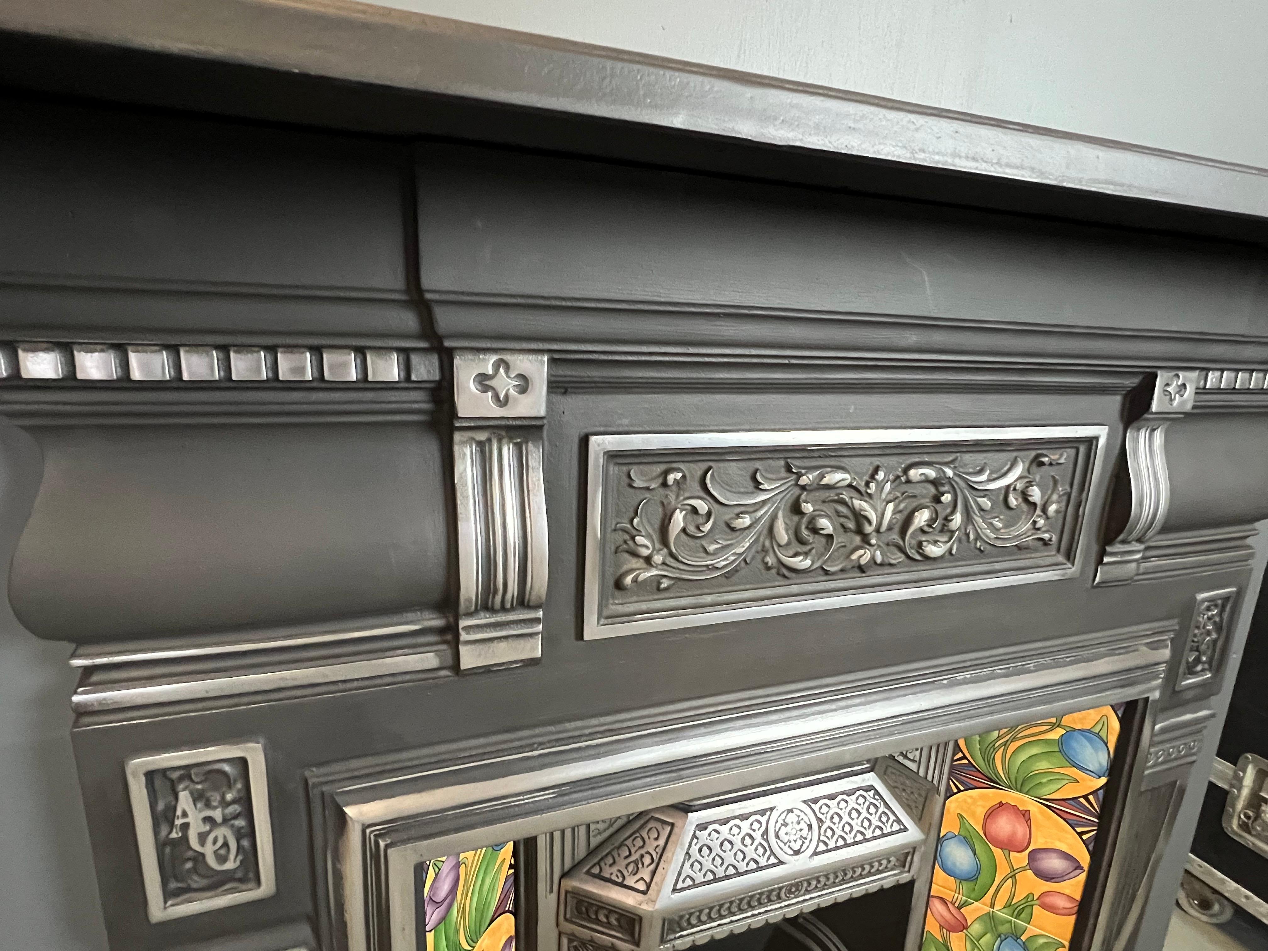 Blackened 20th Century Victorian Style Polished Cast Iron Combination Fireplace. For Sale