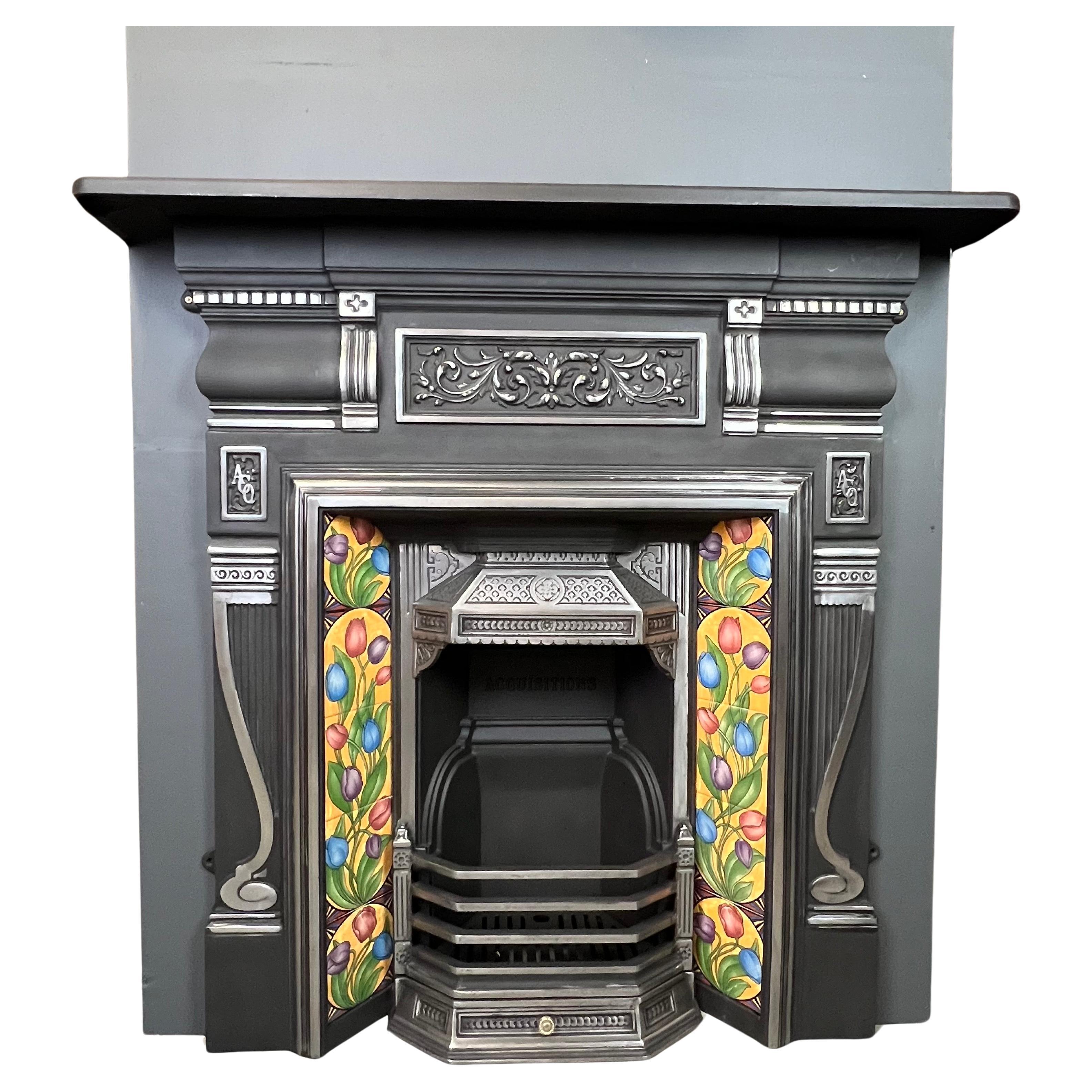 20th Century Victorian Style Polished Cast Iron Combination Fireplace.