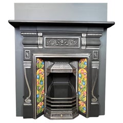 Vintage 20th Century Victorian Style Polished Cast Iron Combination Fireplace.