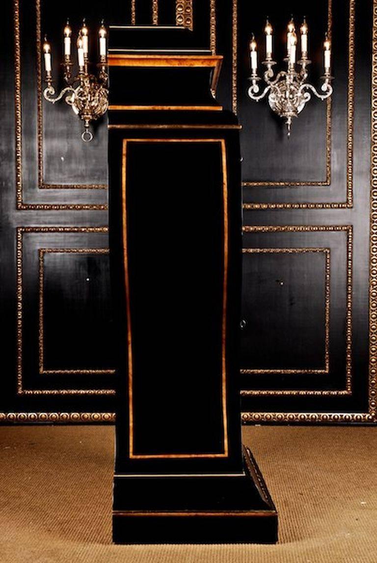 Imposing lyre secrétaire in the manner of Vienna Biedermeier.
Ebonized partially bird’s-eye maple veneer on solid pinewood. Inframed with maple root cap. Internal part architecturally structured and mirrored. Columns with capital and bases. Finely