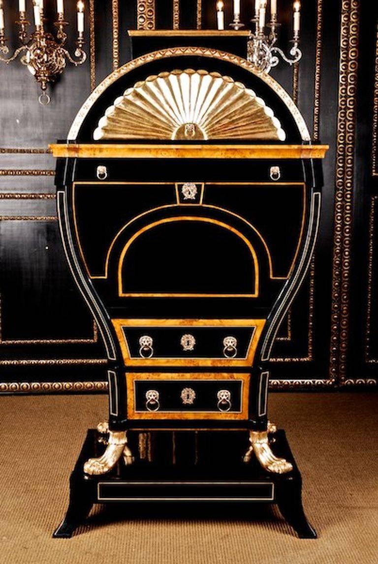 Ebonize, partially bird’s-eye maple root veneer on solid Pinewood. Moulded Lions Masks with grisp rings. This so called lyre secretaire is the crowning of all European furniture Art of the Biedermeier period. Paw-feet and batons from solid