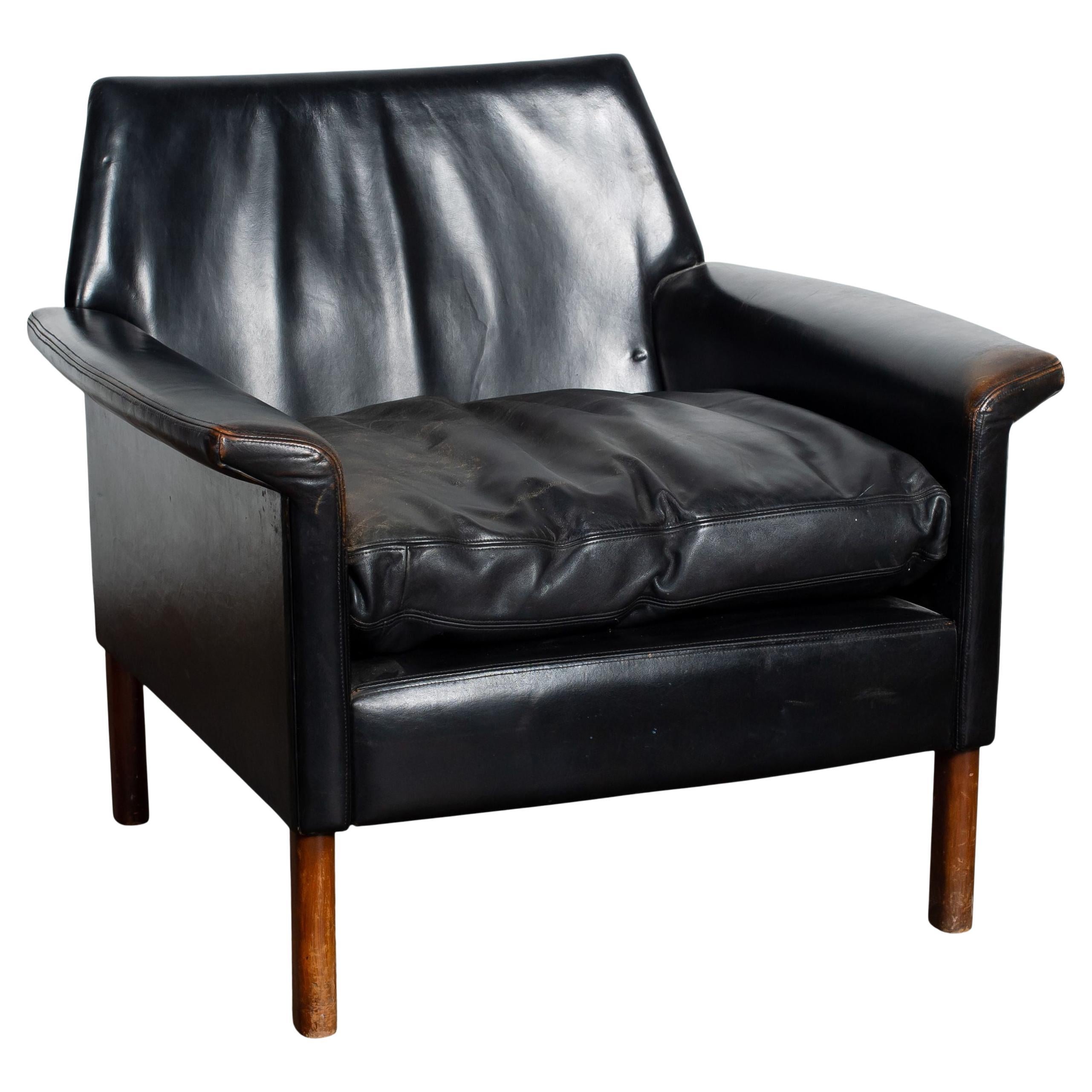 Poltrona in pelle nera vintage del XX secolo