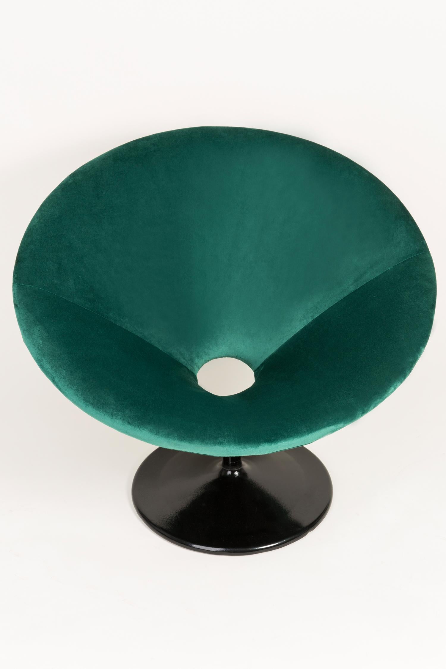 dark green swivel chair