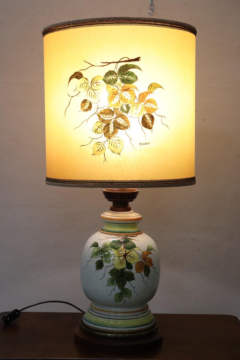 Beautiful table lamp vintage Italian manufacture. Beautiful floral hand painted decoration. This lamp is a true work of art.