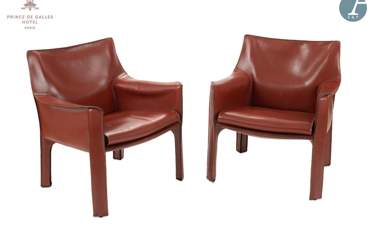 This iconic chair designed by Mario Bellini for Cassina in late 1970s, Italy, features the original deep red saddle leather which is wrapped atop a steel frame. The back legs feature a black zippered detail. The chair can easily be used for dining