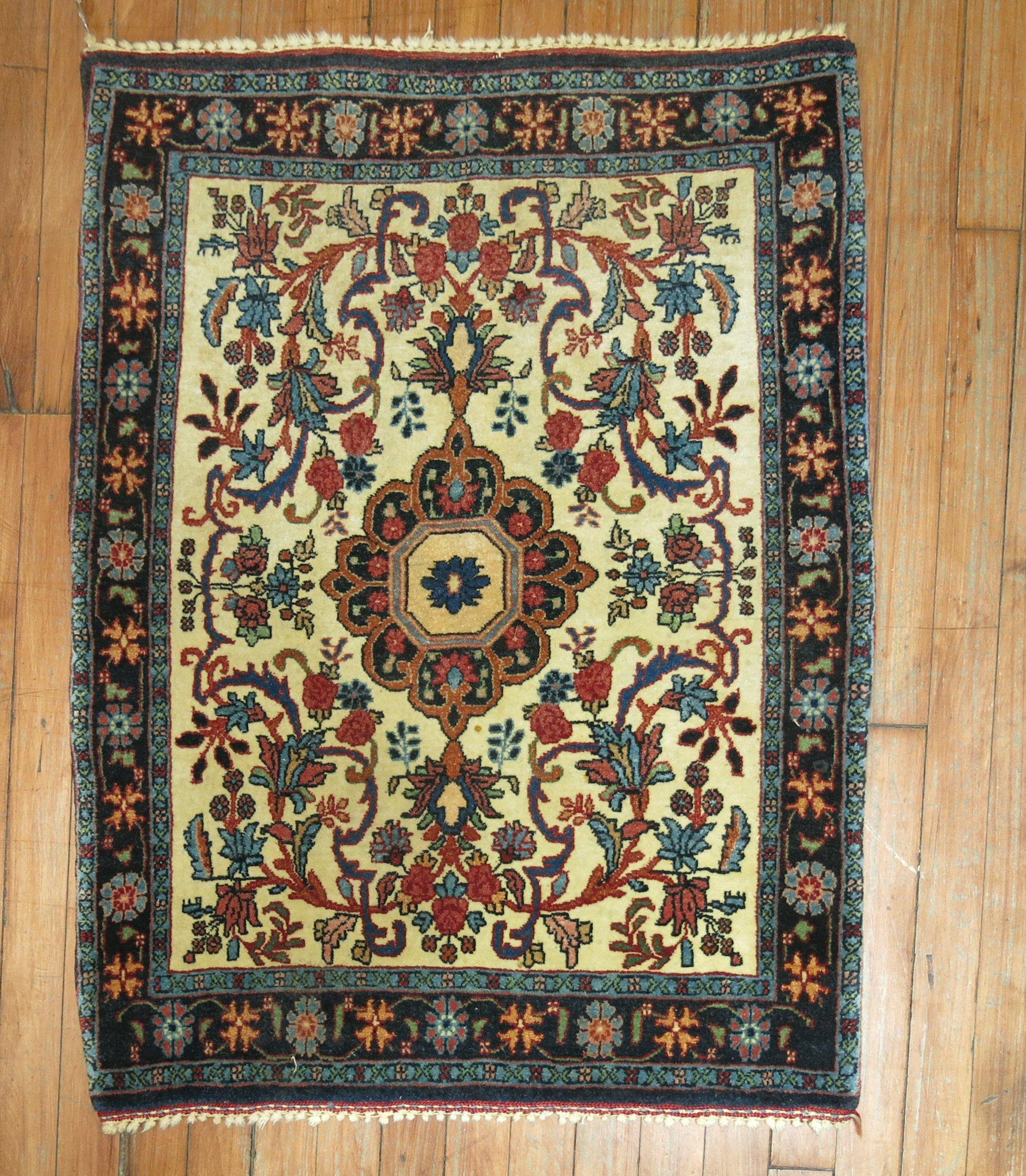 A mid 20th century Persian Bidjar traditional mini rug

Measures: 2'4