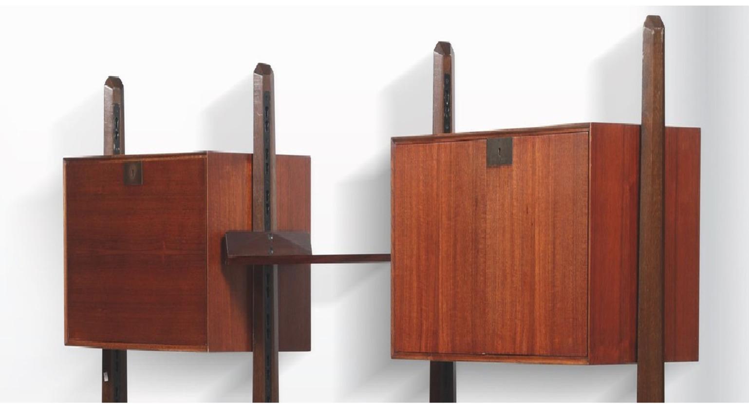 Large bookcase with storage units and shelves entirely made in wood with brass details, designed by Vittorio Dassi and manufactured by Dassi Mobili Moderni, Lissone in 1950s. 

The furniture by Vittorio Dassi, was made prevalently during the '40s