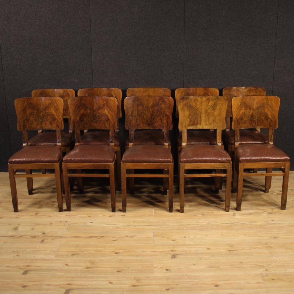 Group of ten Italian chairs from the mid-20th century. Furniture in walnut wood and walnut burl of particular line and construction. Chairs complete with seat with spring padding in good condition. Seat height of 48 cm, of good comfort. A pleasantly