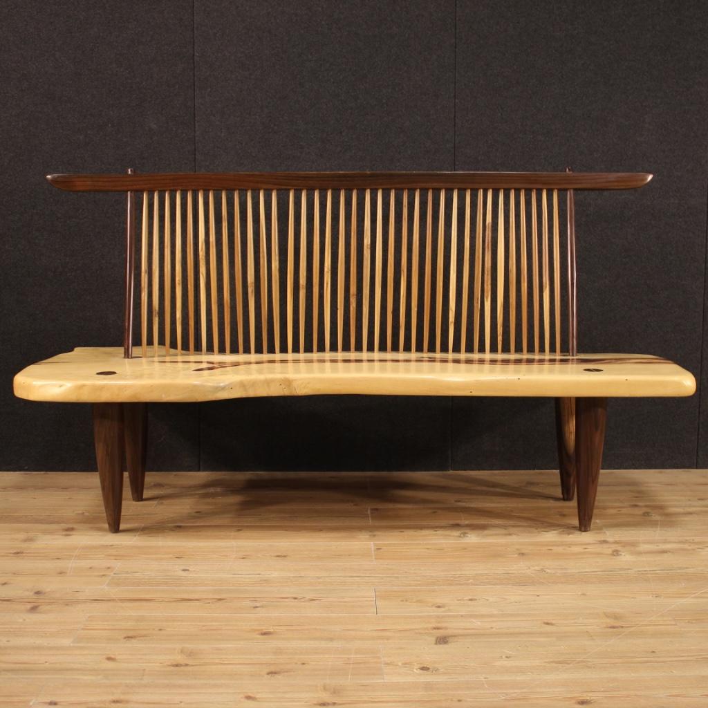 George Nakashima style design sofa from the late 20th century. Furniture carved in walnut and exotic wood from the famous line of the American designer / architect. Reproduction of excellent quality with characteristics similar to the original