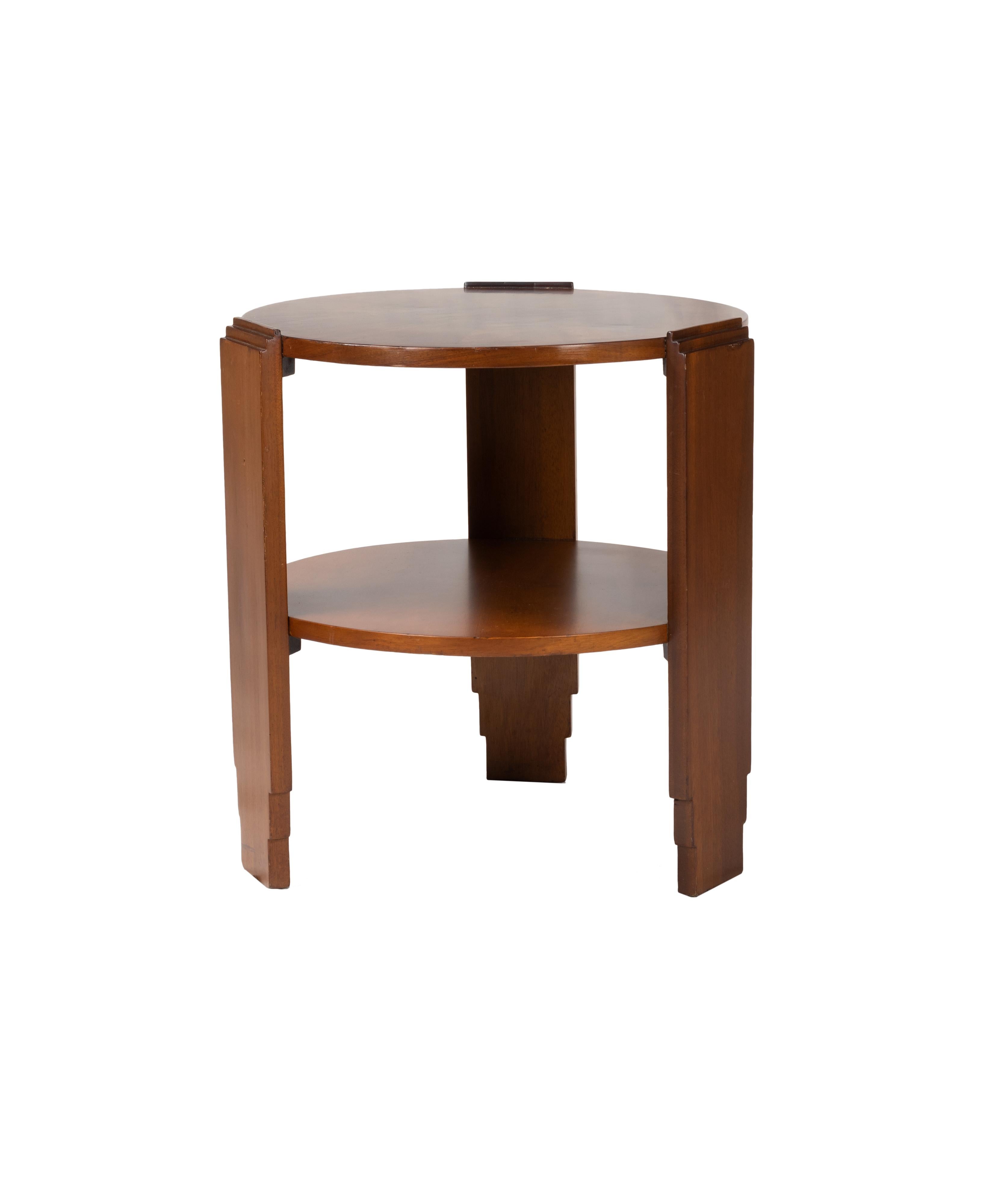 A french Art Deco two levels round center table of inlaid walnut and a beautiful center, three legs and a circular base.
