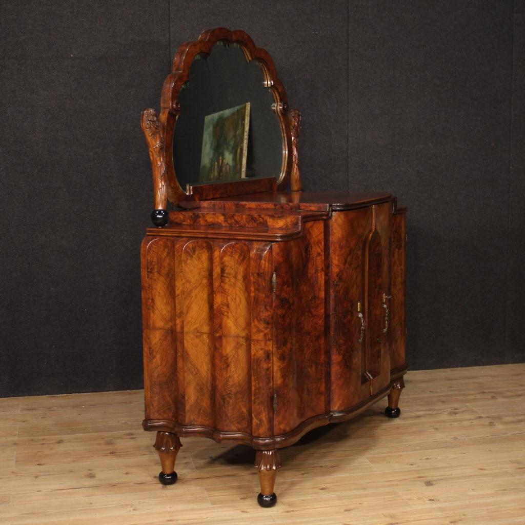 Italian sideboard / dresser with mirror from mid-20th century. Furniture of exceptional quality carved in walnut, burl walnut, ebonized wood and beech. Sideboard with two doors, complete with working key, fitted with three internal drawers of