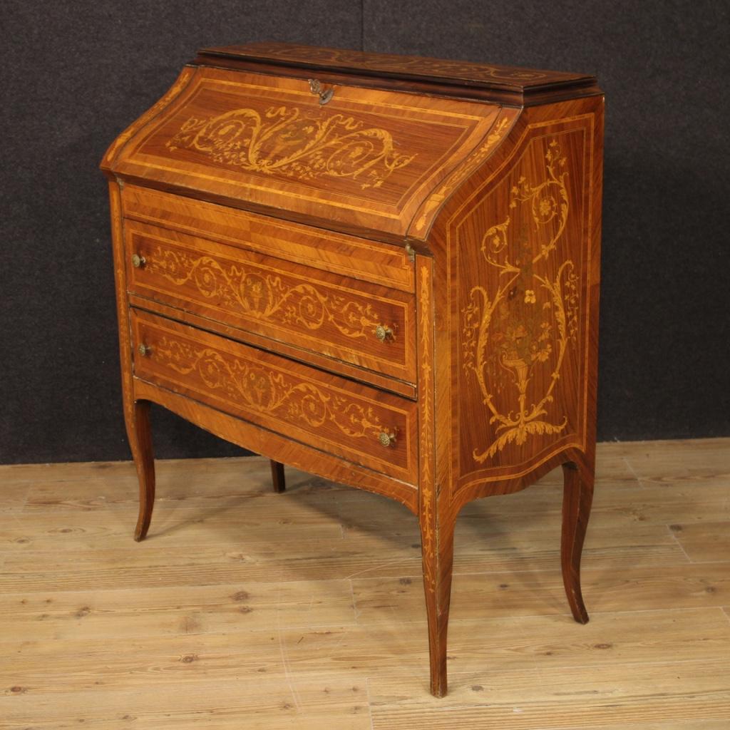 Italian bureau from the mid-20th century. Inlaid furniture in walnut, palisander, rosewood, maple, mahogany, fruitwood of beautiful line and pleasant decor. Bureau with two external drawers of good capacity and fall-front. Inside of the bureau with