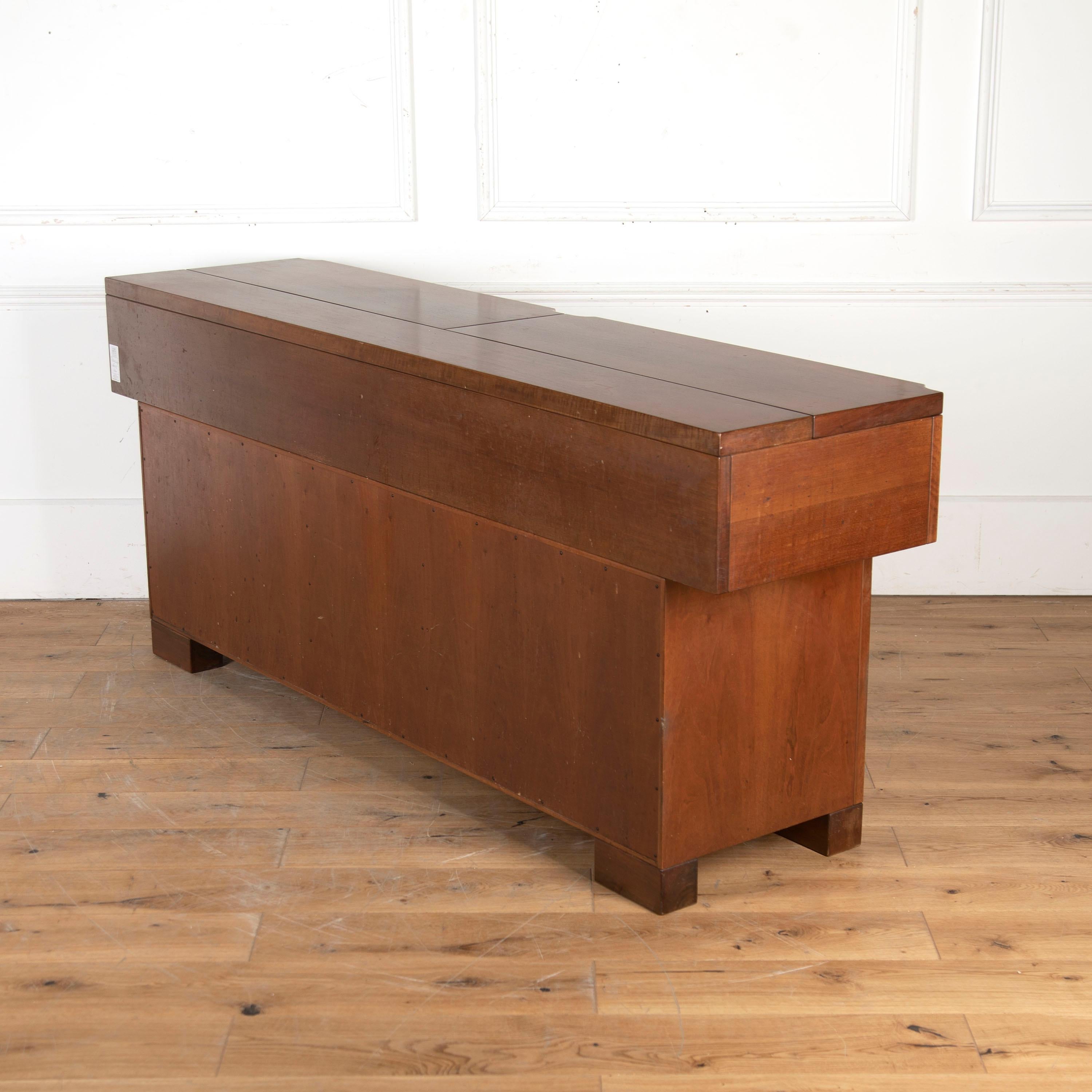 Superb mid 20th Century Italian solid walnut sideboard, designed by Giovanni Michelucci for Poltronova.

With strong architectural lines, this piece features three cupboards, two drawers and is signed by the designer.

This is a fantastic