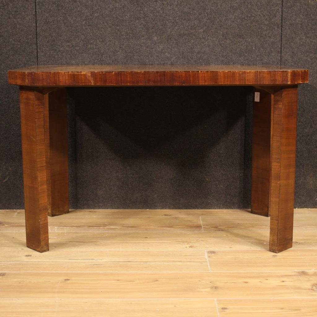 Italian coffee table from the mid-20th century. Beautiful Art Deco style walnut veneer furniture. Good size and service coffee table, supported by four solid legs, of good stability. Furniture for antique dealers and interior decorators, in