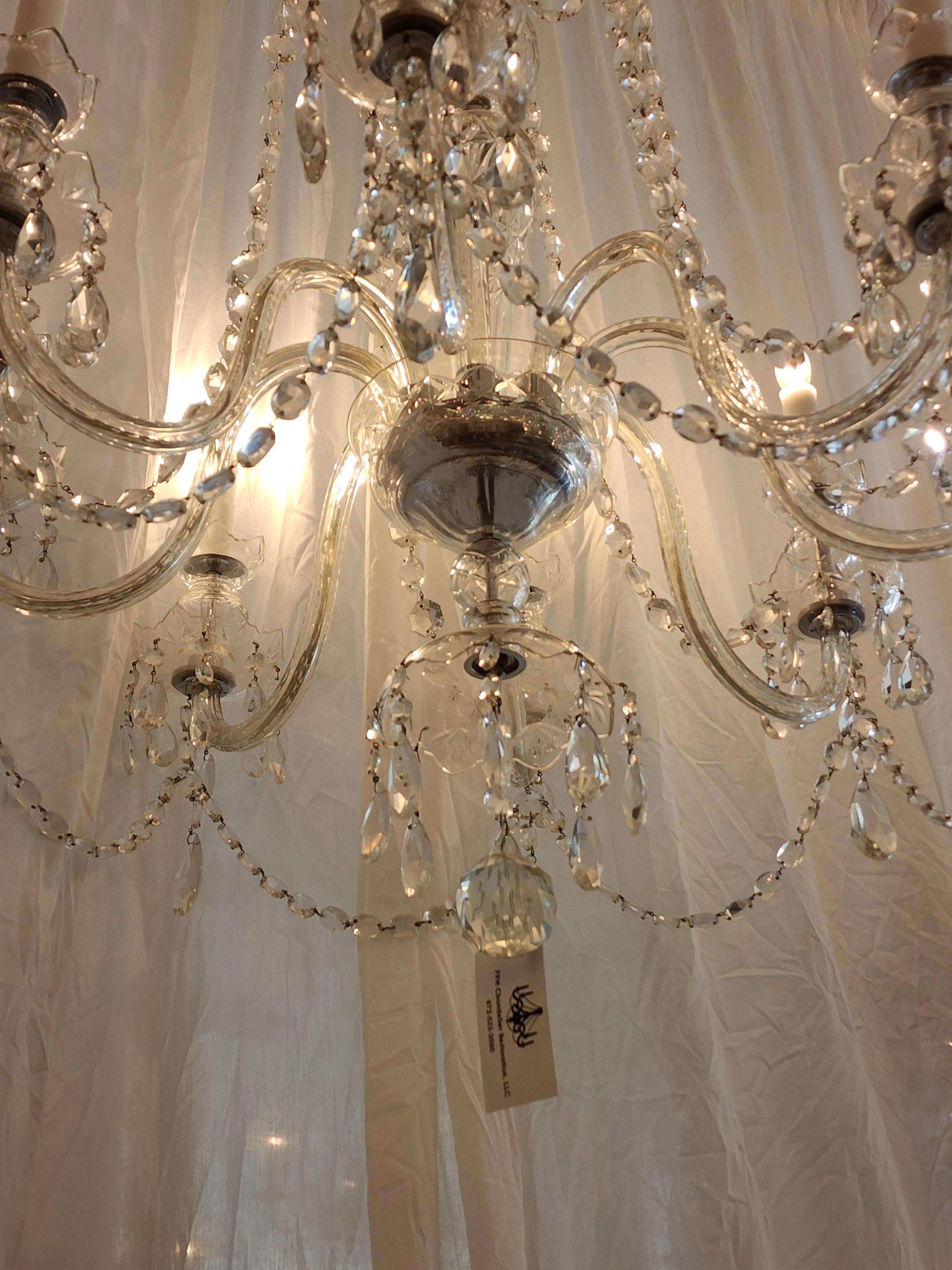 Antique Waterford crystal chandelier with Wax candle covers.