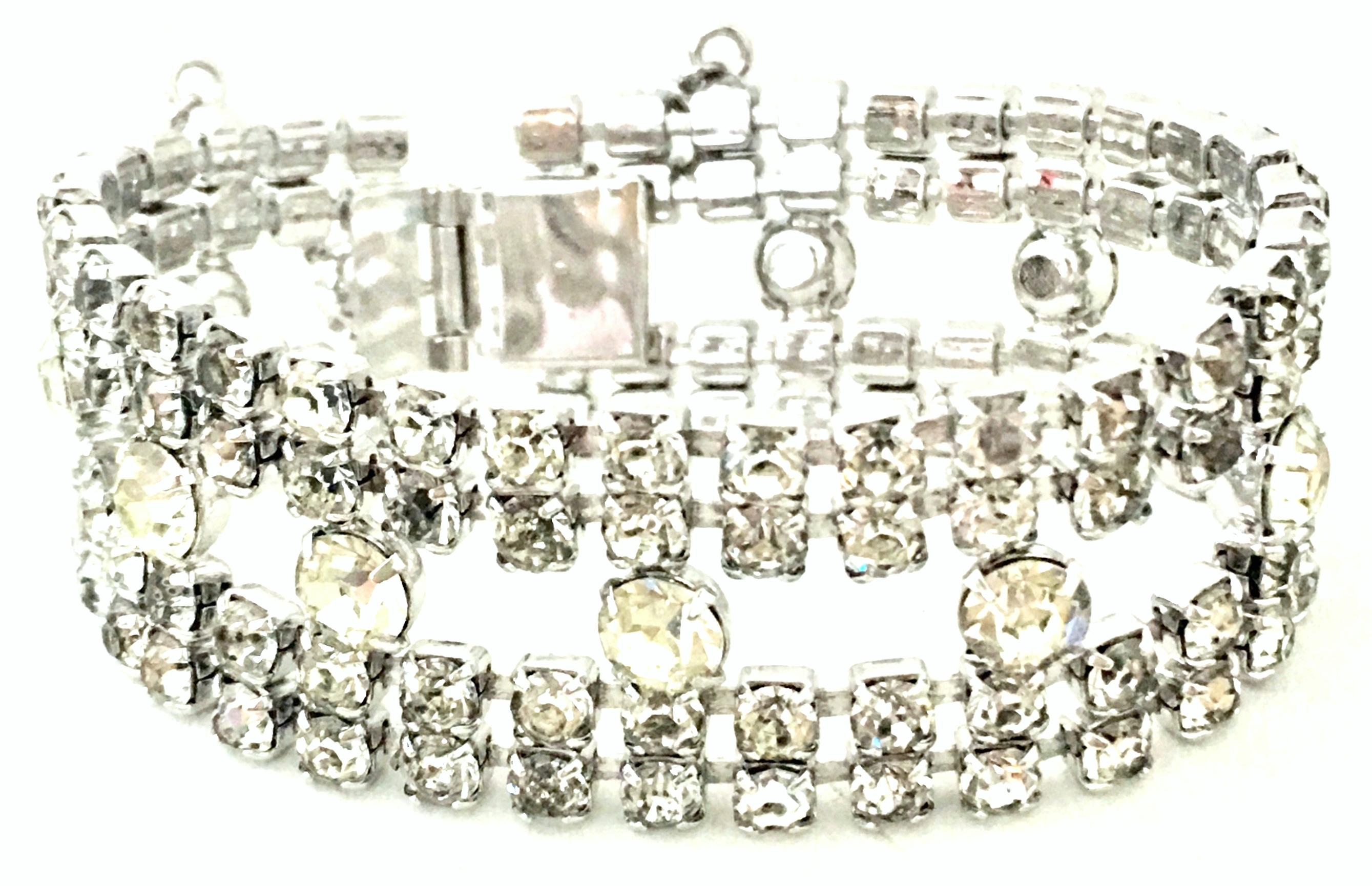 20th Century Weiss Style Silver Rhodium Plate & Swarovski Crystal Round Prong Set Bracelet. This Art Deco style bracelet features brilliant crystal clear stones with a jeweled locking box style and security chain dual clasp system.