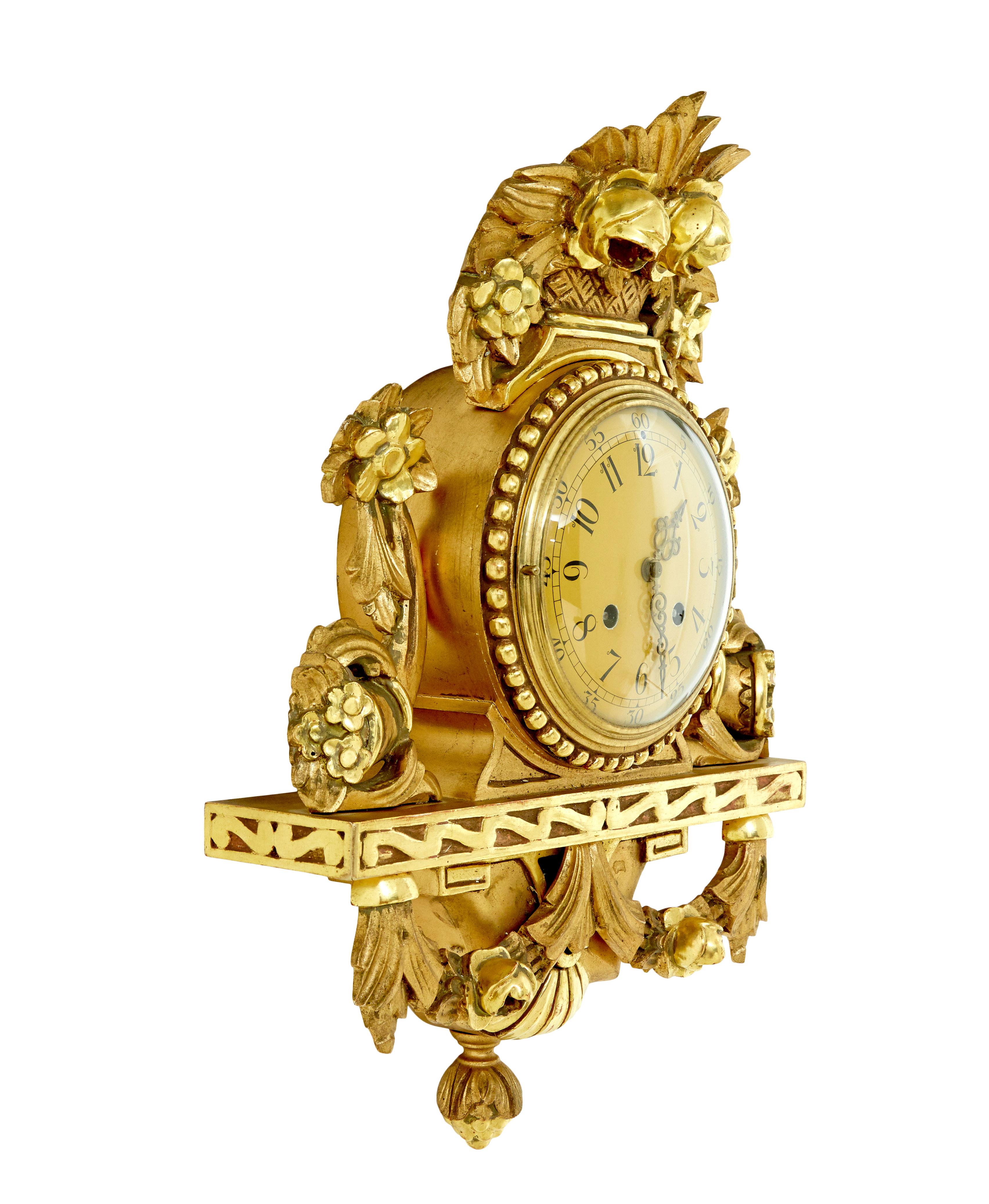 Carved 20th century Westerstrand rococo revival gilt carved clock For Sale