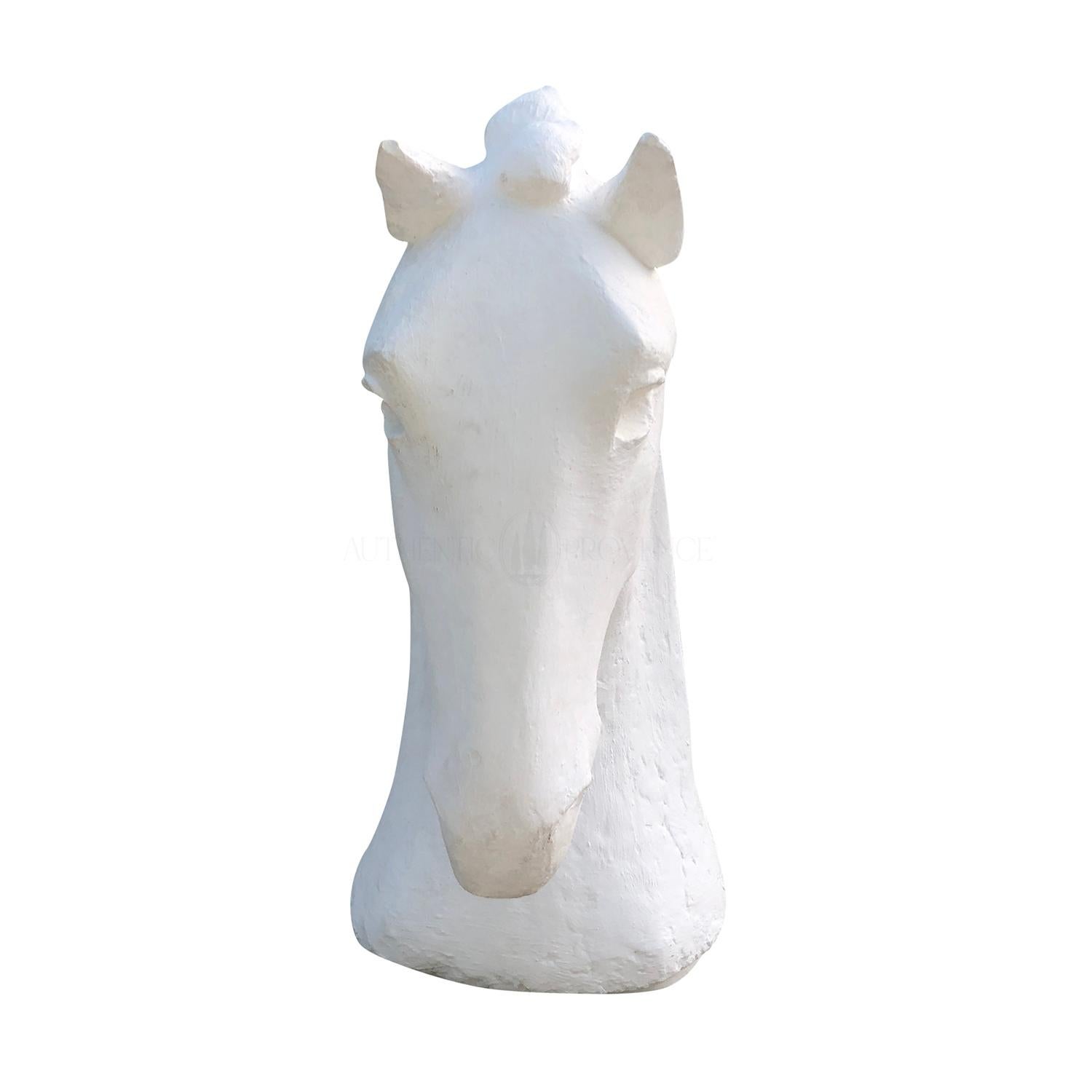 A white, vintage Mid-Century Modern French tall decorative horse head made of hand crafted plaster of Paris in the manner of Antoine Bourdelle, in good condition. Wear consistent with age and use. circa 1940, Paris, France.