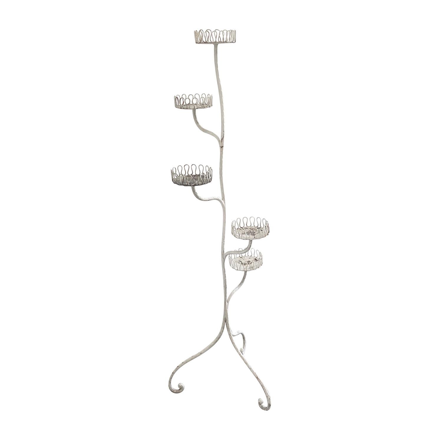 A white, vintage Italian plant stand with five plant holders, made of hand crafted forged metal in the Style of Gio Ponti, in good condition. The patinated stand is set on a scrolled tripod base. Minor fading, due to age. Wear consistent with age