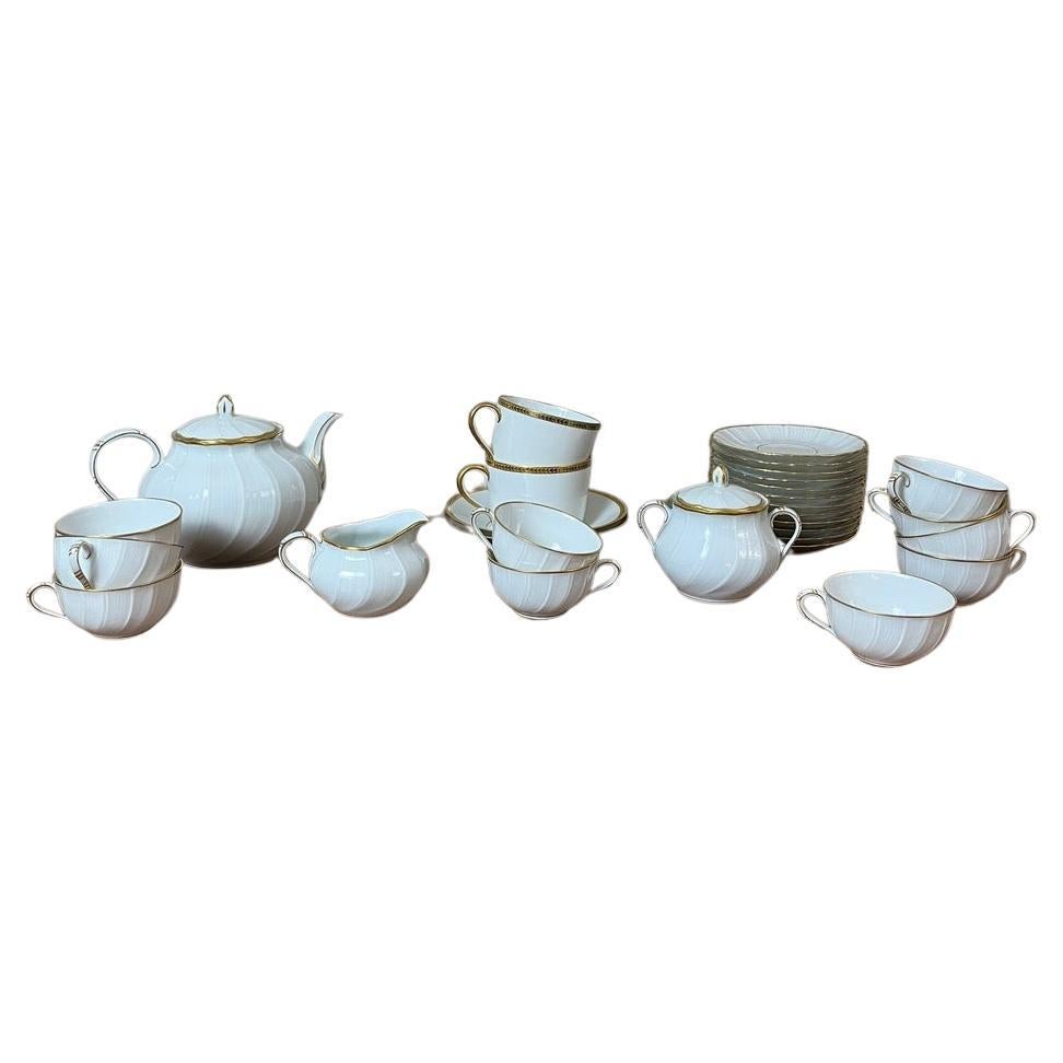 Elegant Limoges Porcelain Tea Set by Bernardaud – Gold Trimmed

Refined and timeless, this exquisite Limoges porcelain tea set is crafted by the prestigious house of Bernardaud, 
