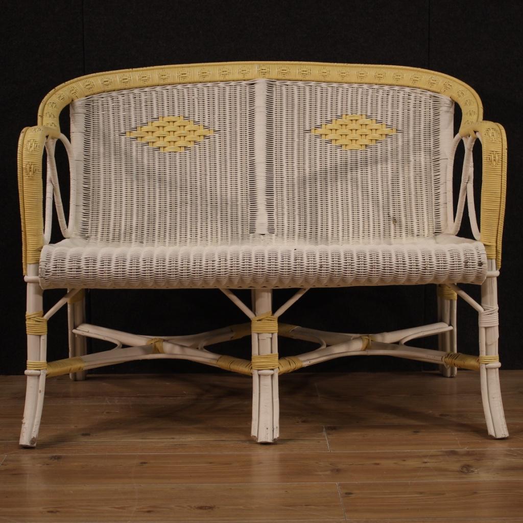 Italian sofa from the 1980s. Wicker furniture of beautiful lines and pleasant furnishings. Ideal sofa to be placed in a garden or under a porch but also usable inside the house. Furniture part of a set also composed of two armchairs (see photo and