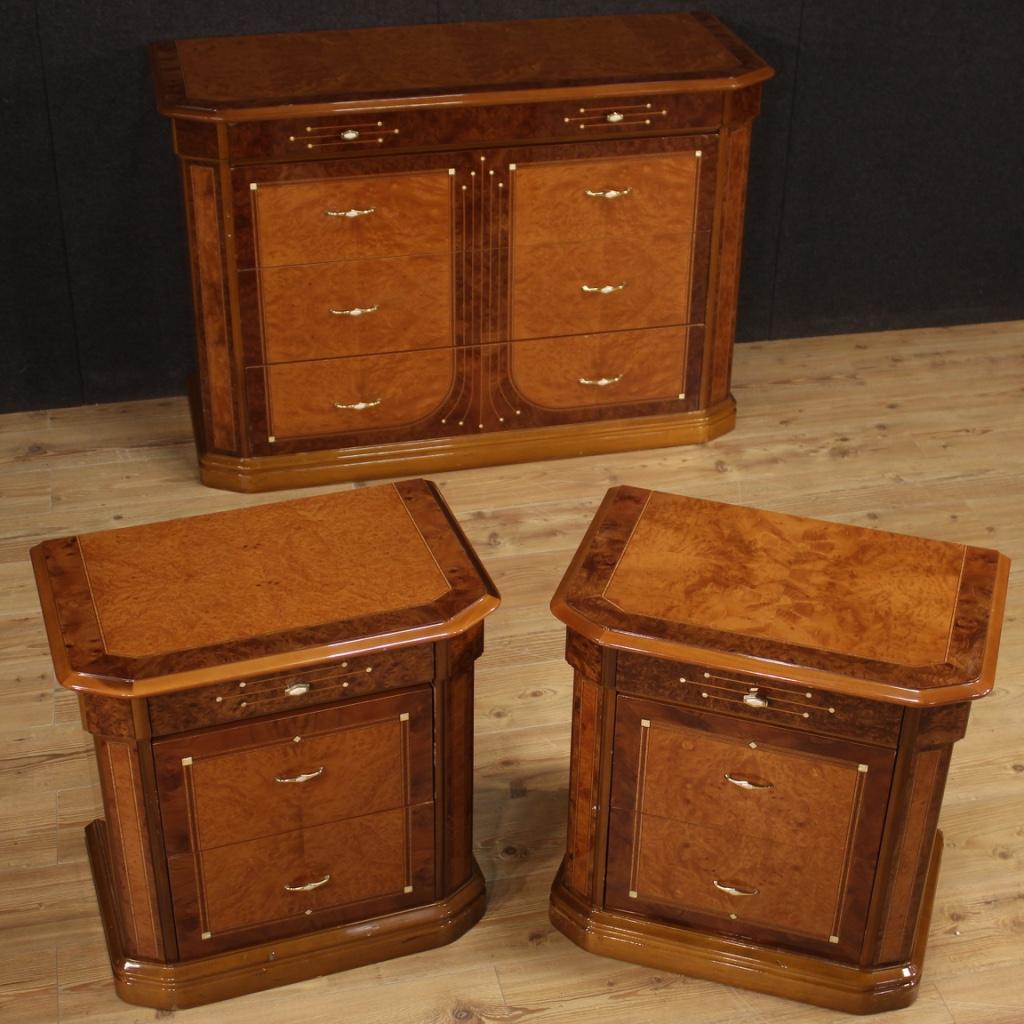 Chest of drawers of Italian production of the late 20th century. Furniture veneered in walnut, burl, rosewood, faux mother of pearl, ebonized wood, beech and fruitwood. Dresser for bedroom or living room of beautiful size and pleasant decor.