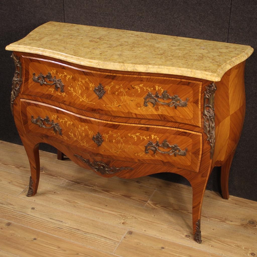 French dresser from the mid-20th century. Moved and rounded Louis XV style furniture in walnut, rosewood, maple and fruitwood, adorned with floral inlay on the drawers. Top in original marble in perfect condition of good size and service. Furniture